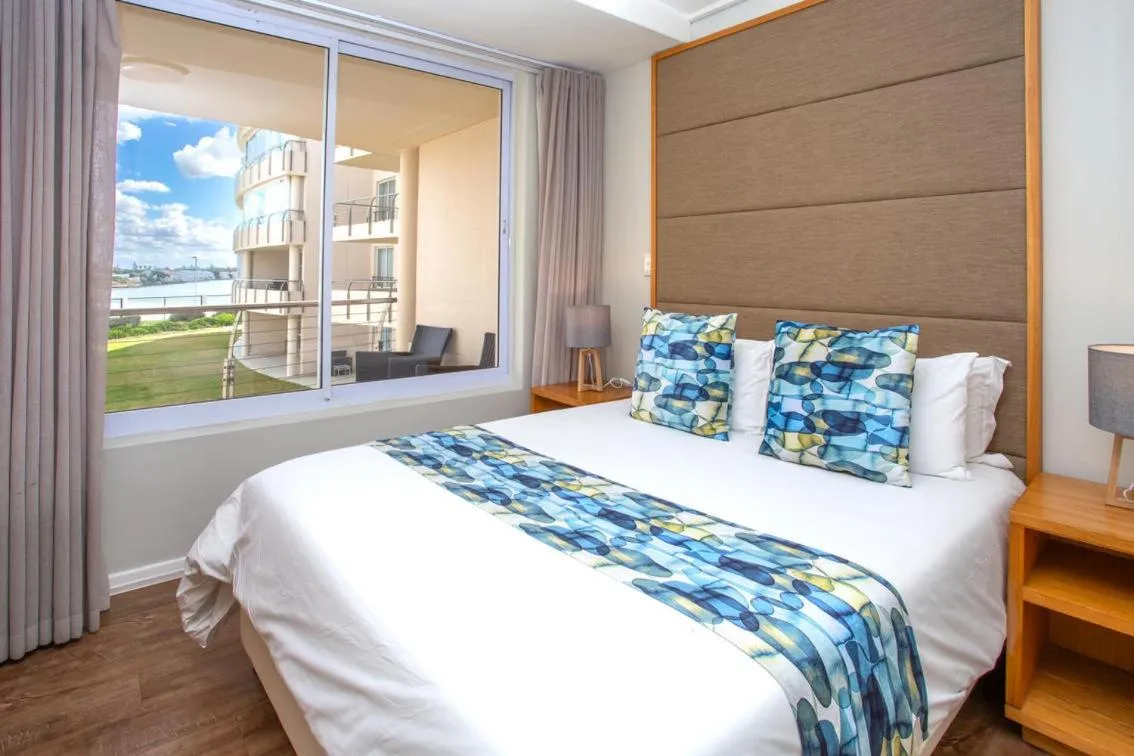 Bed in Lagoon Beach Hotel Apartments