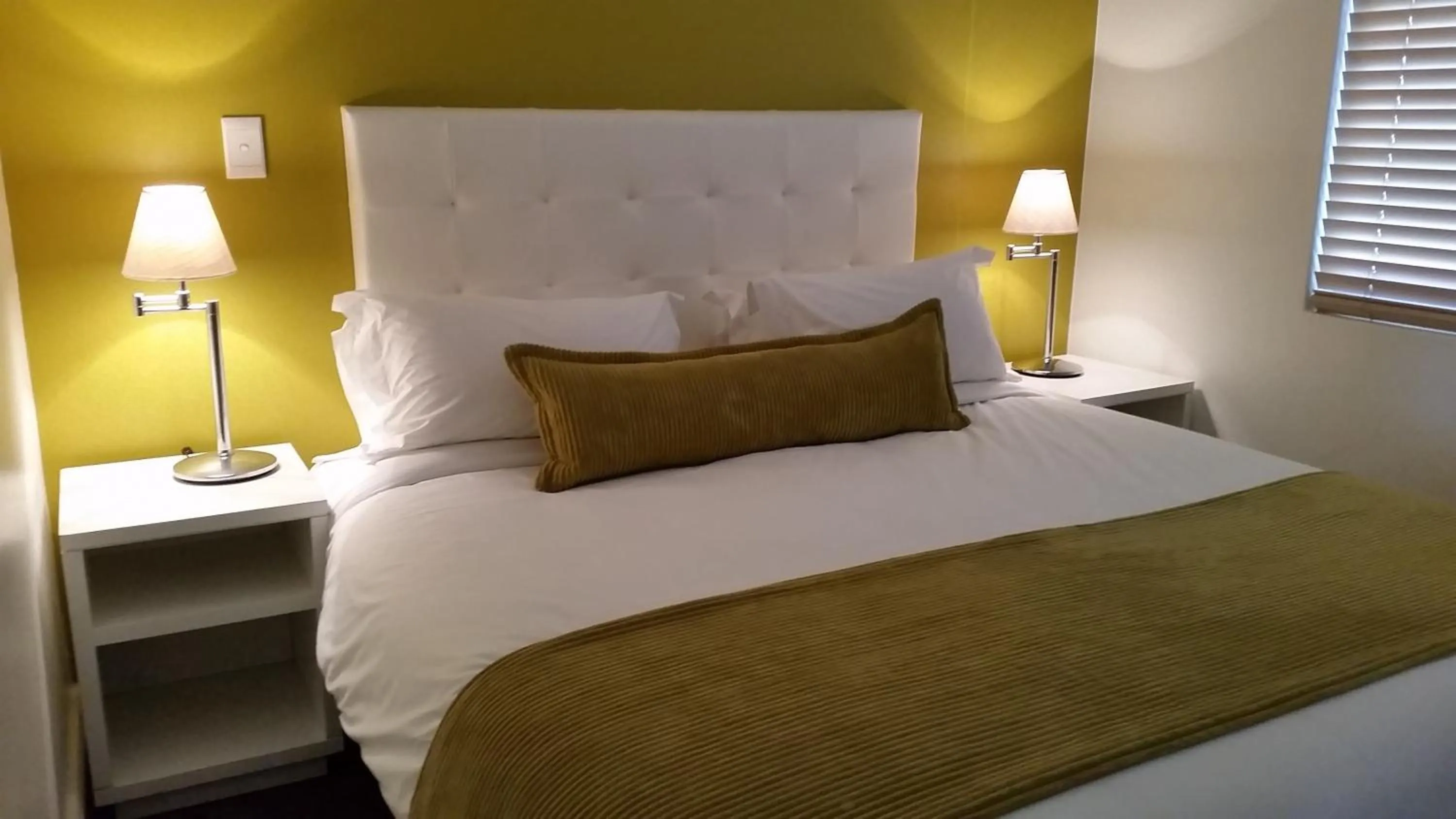 Bed in Lagoon Beach Hotel Apartments