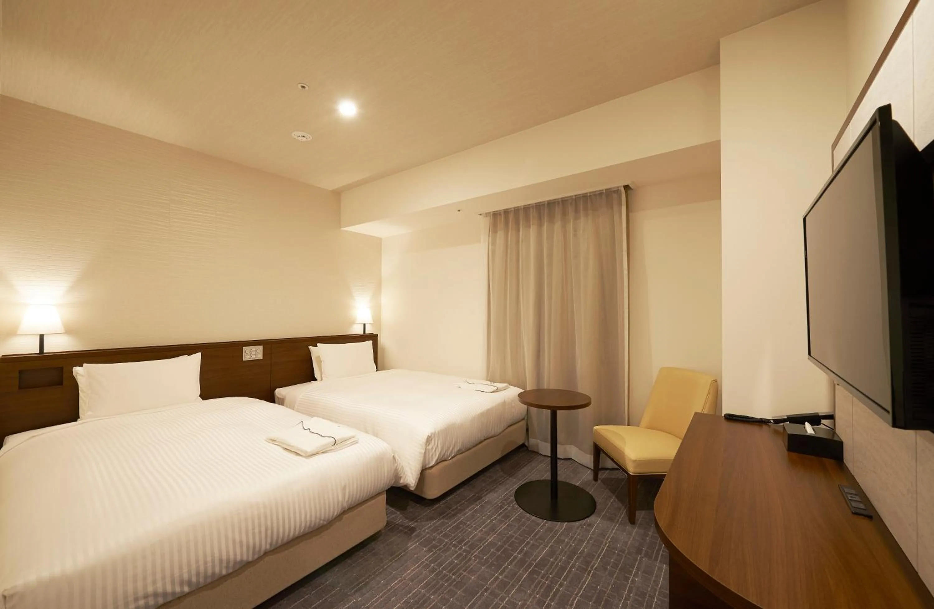 Bed in Sotetsu Fresa Inn Tokyo Roppongi