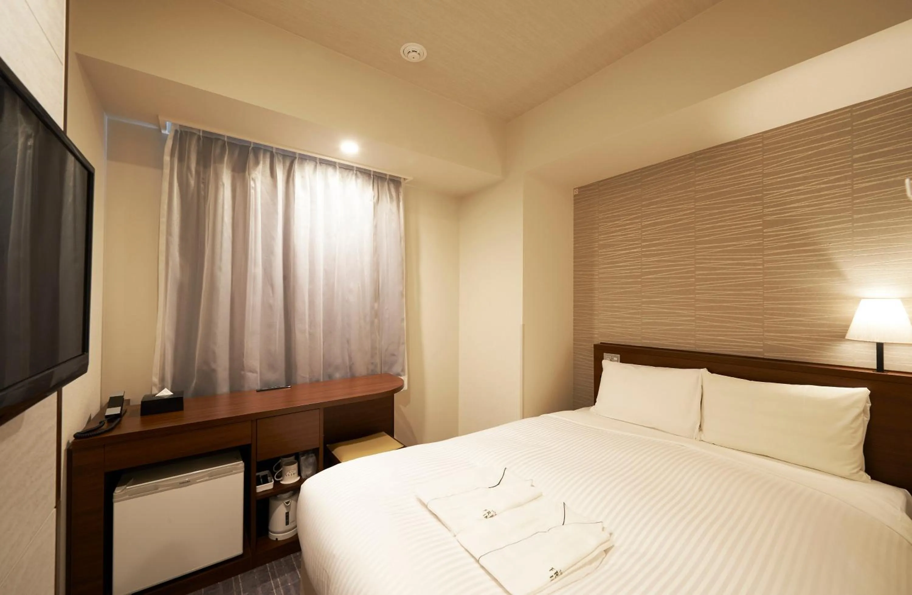 Bed in Sotetsu Fresa Inn Tokyo Roppongi