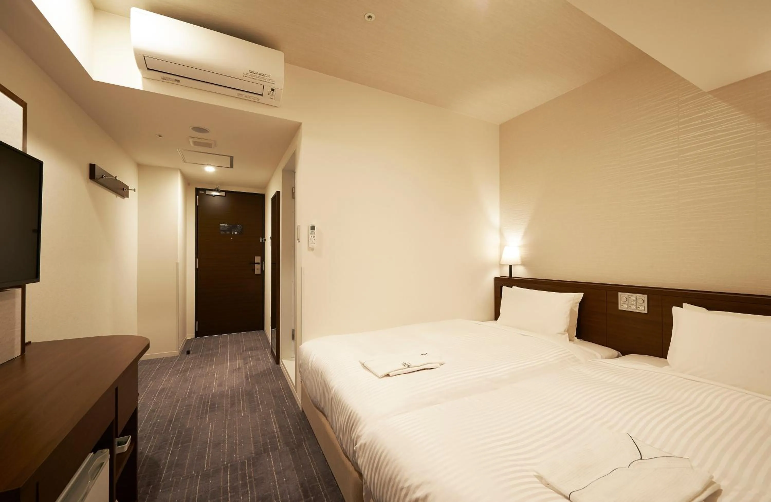 Bed in Sotetsu Fresa Inn Tokyo Roppongi