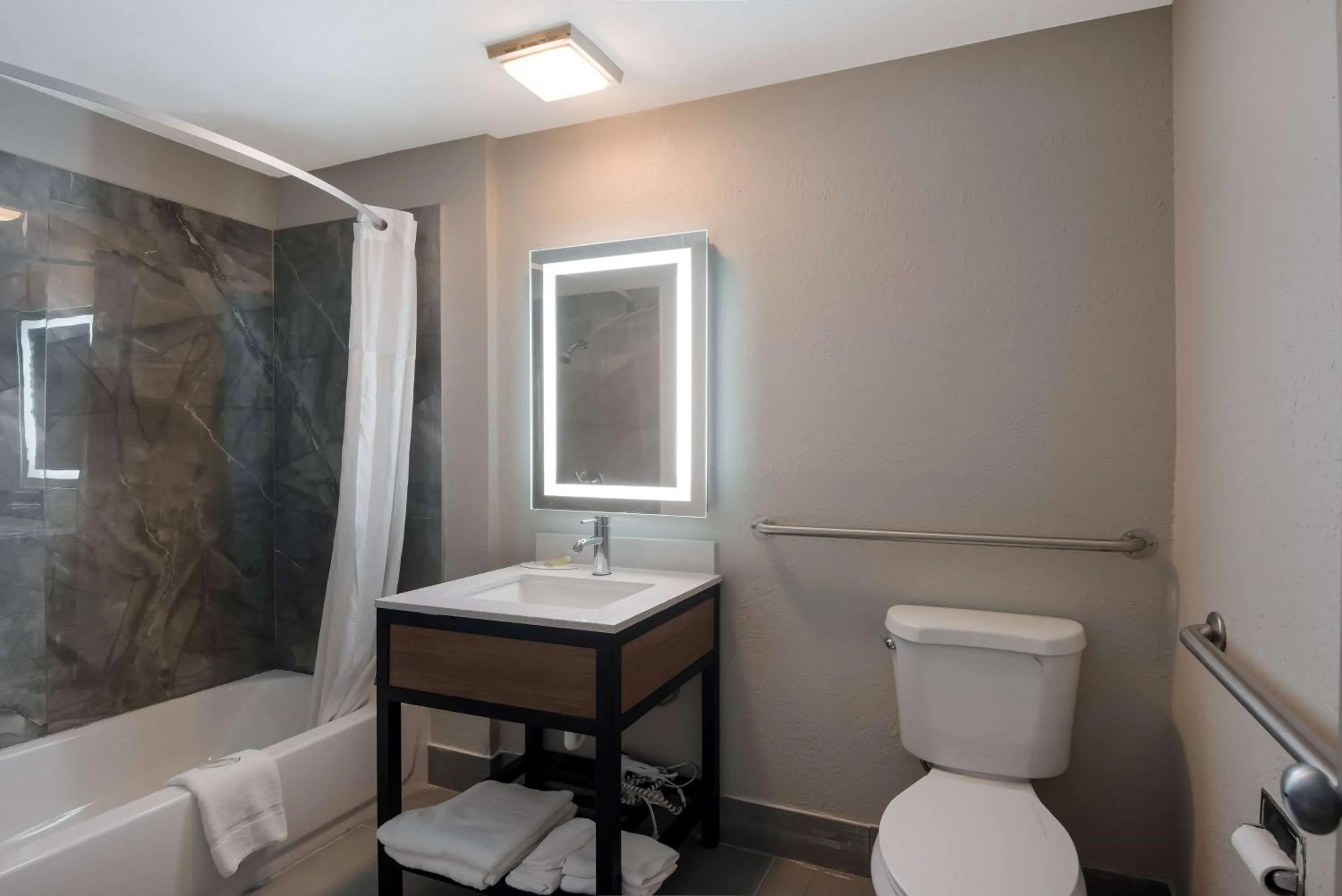Bathroom in Days Inn by Wyndham Ankeny - Des Moines