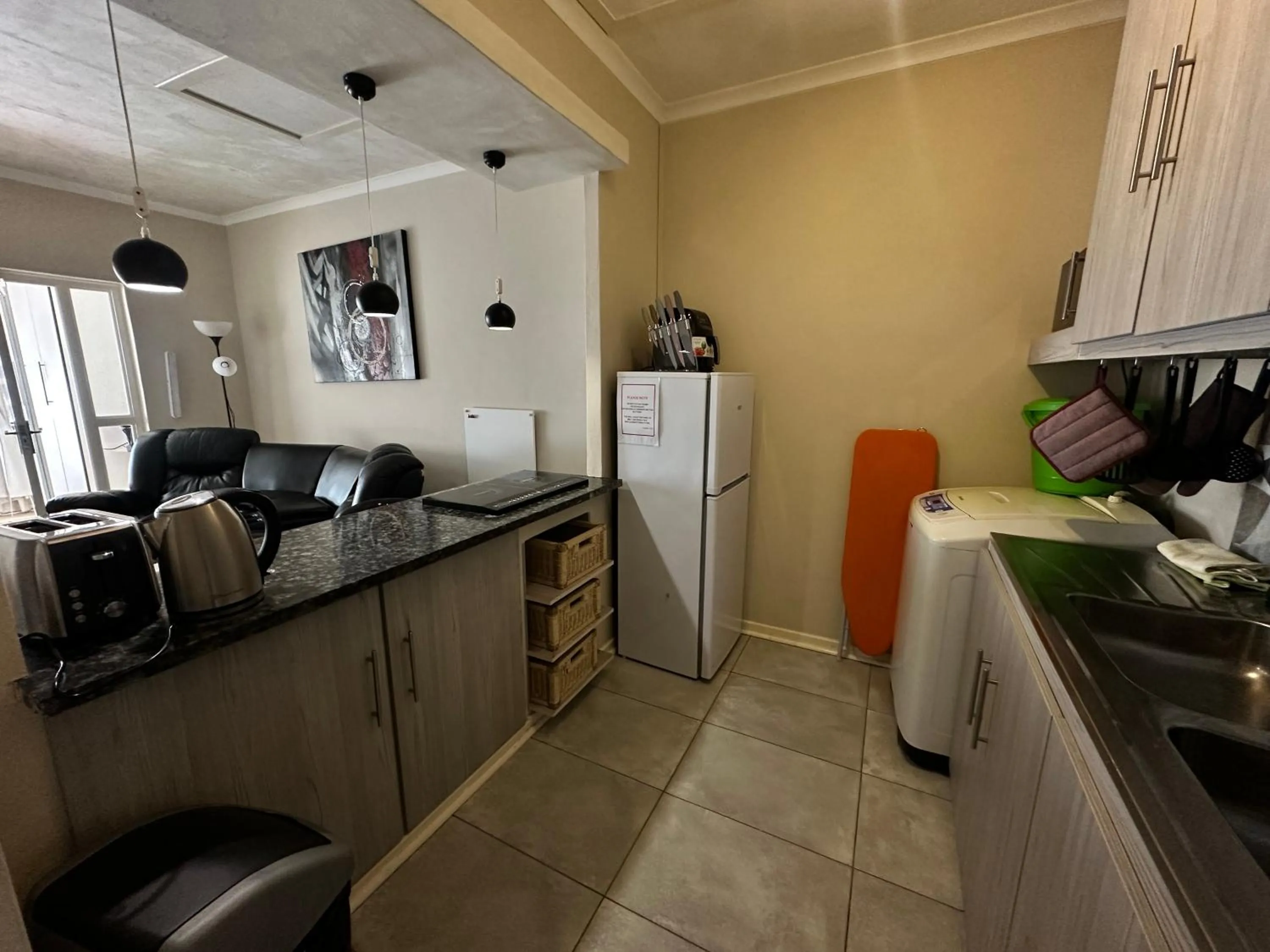 Kitchen or kitchenette in Kiwara Guesthouse