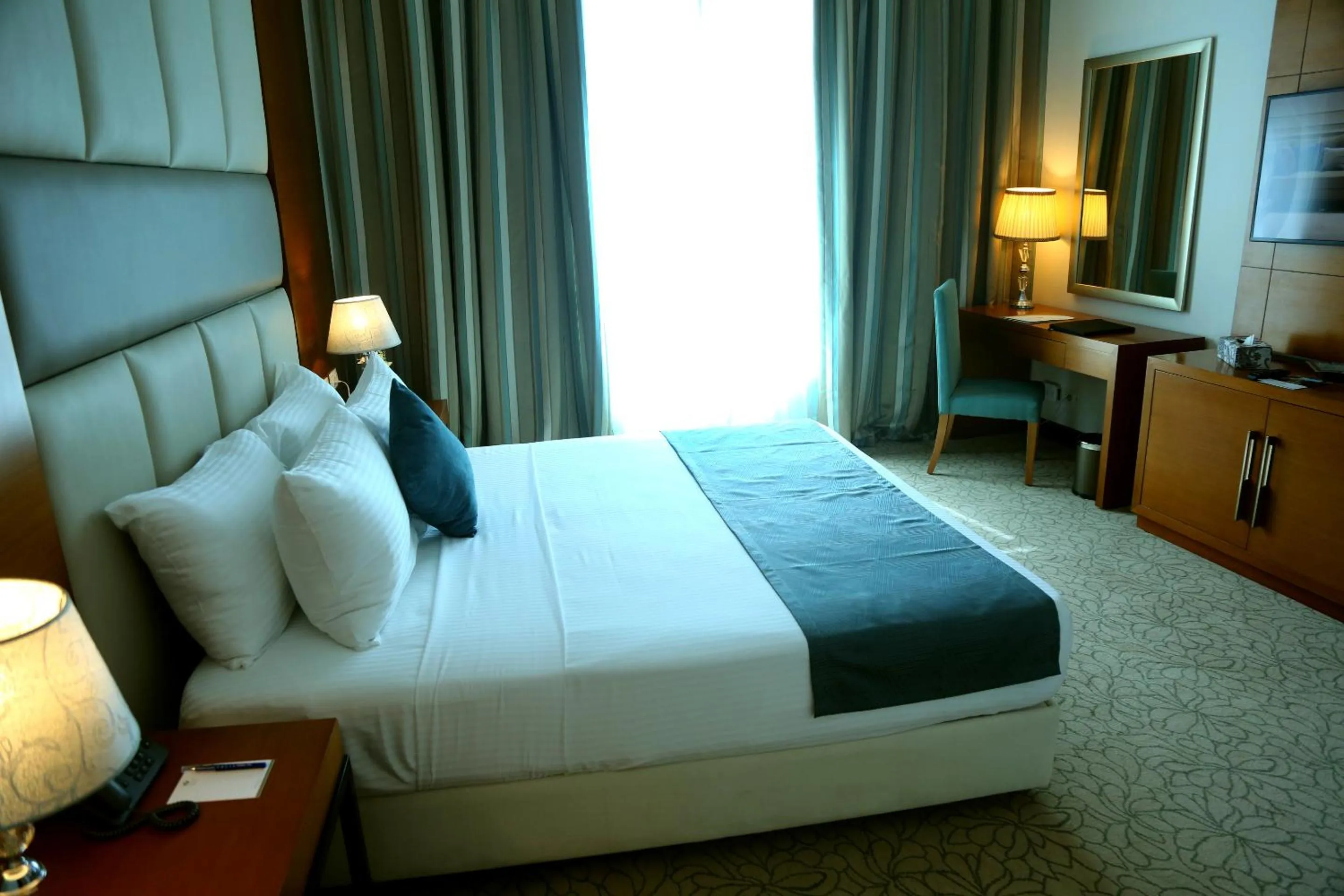 Bedroom, Bed in Tolip Golden Plaza