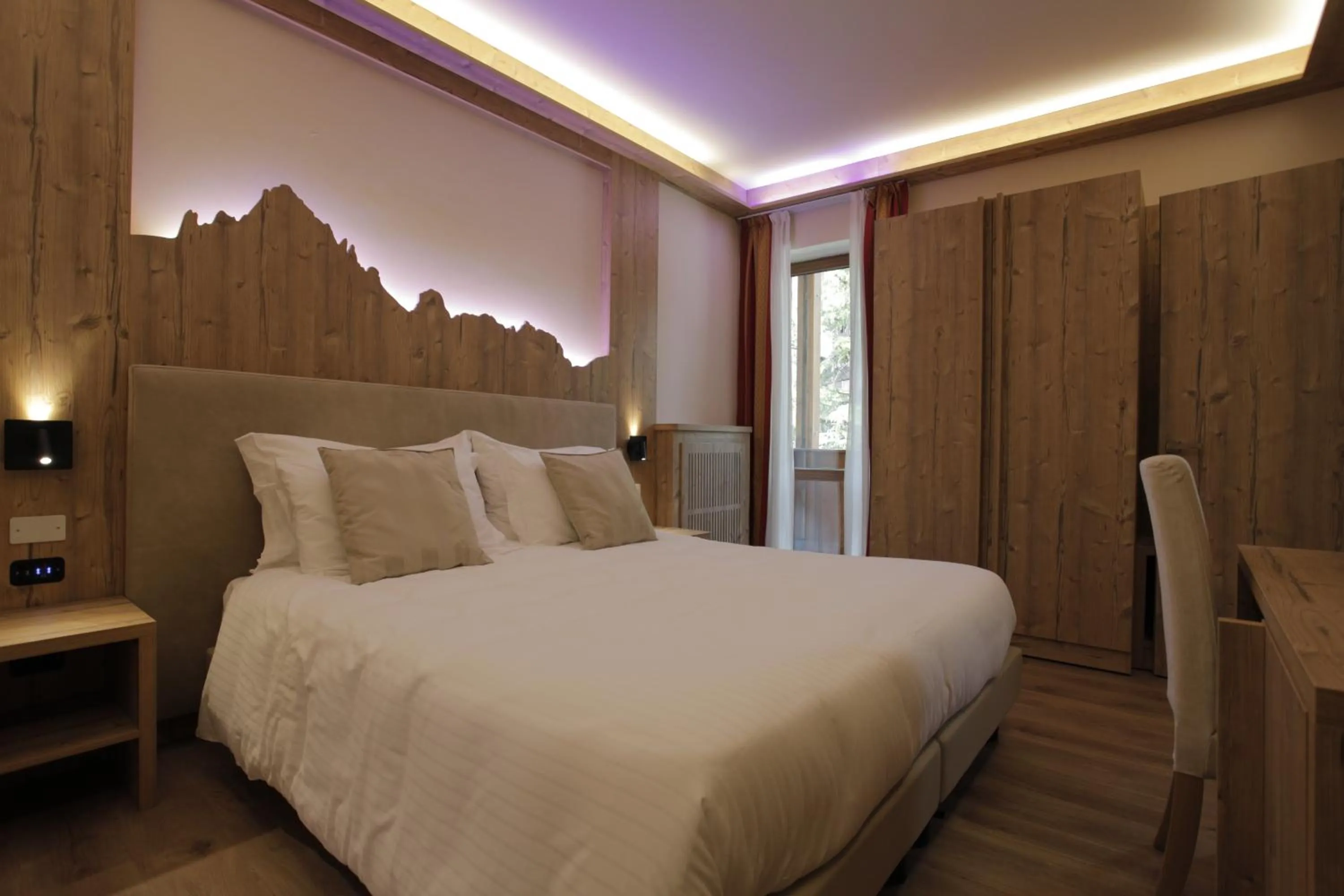 Bedroom, Bed in Hotel Cima Rosetta - BW Signature Collection