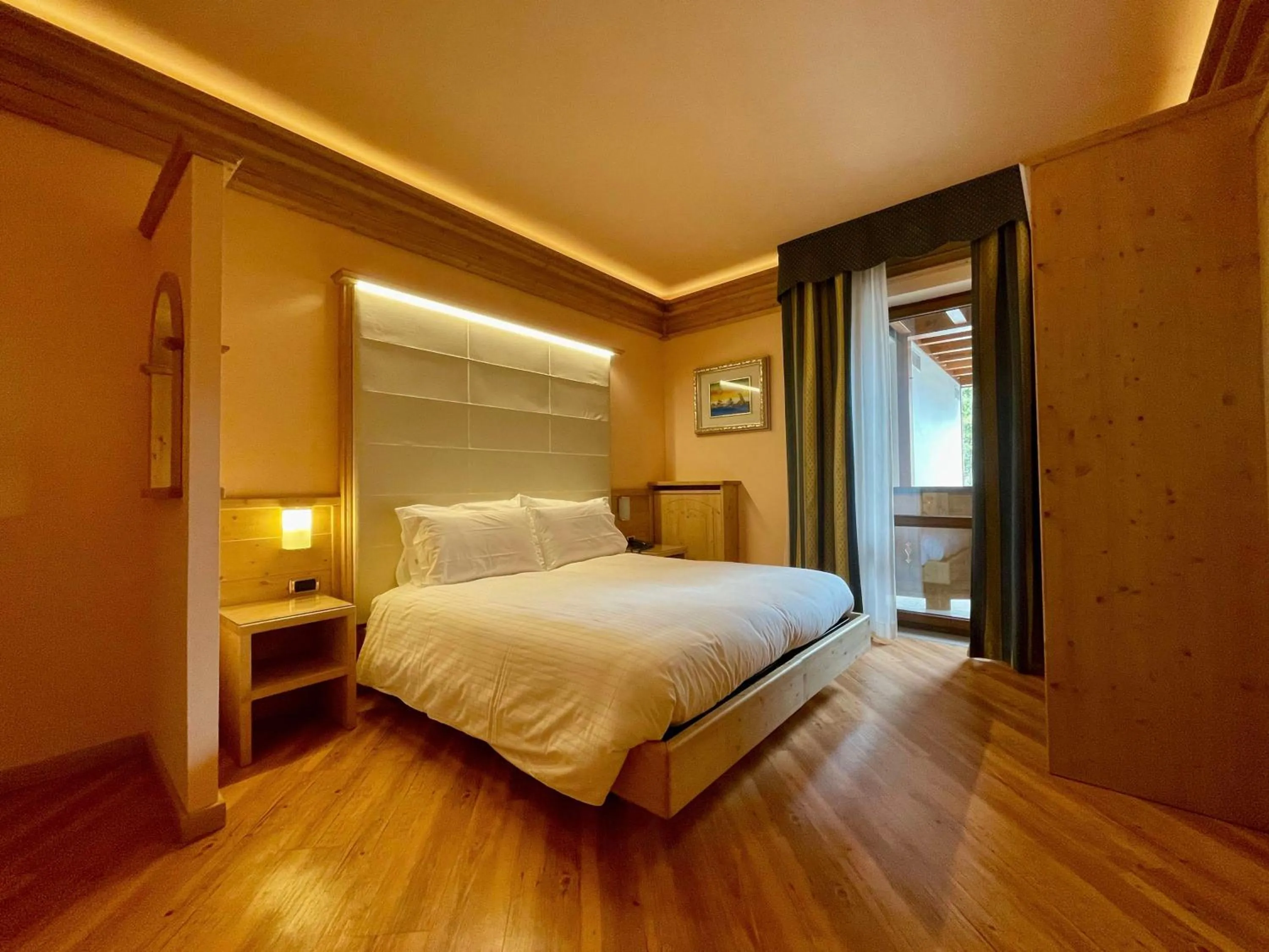 Bedroom, Bed in Hotel Cima Rosetta - BW Signature Collection