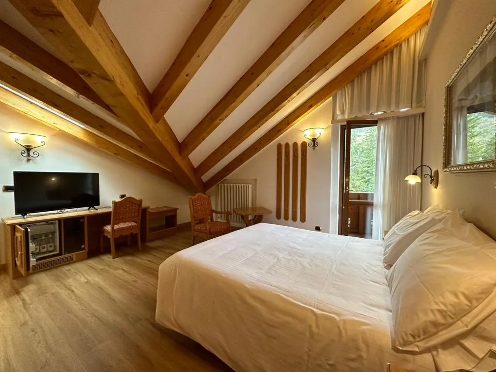 Bed in Hotel Cima Rosetta - BW Signature Collection