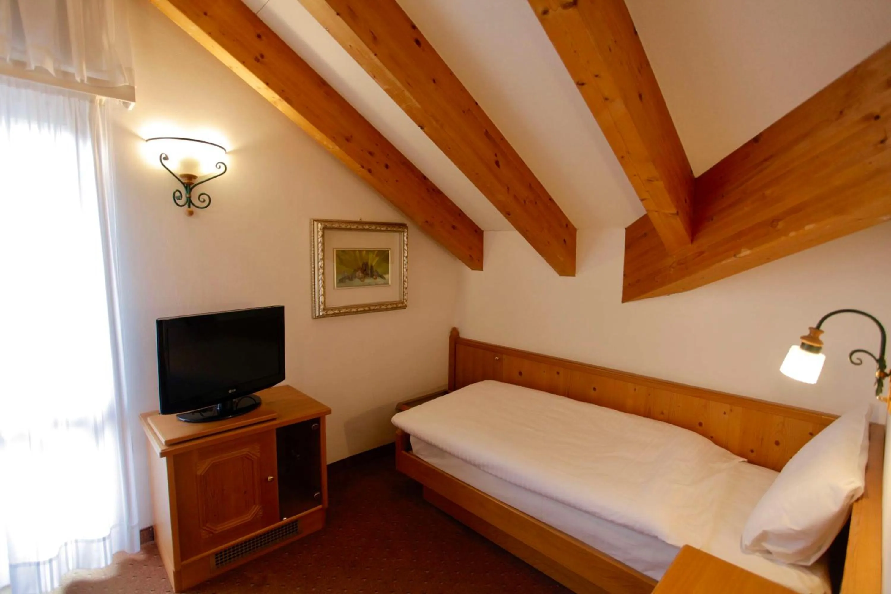 Bedroom, Bed in Hotel Cima Rosetta - BW Signature Collection