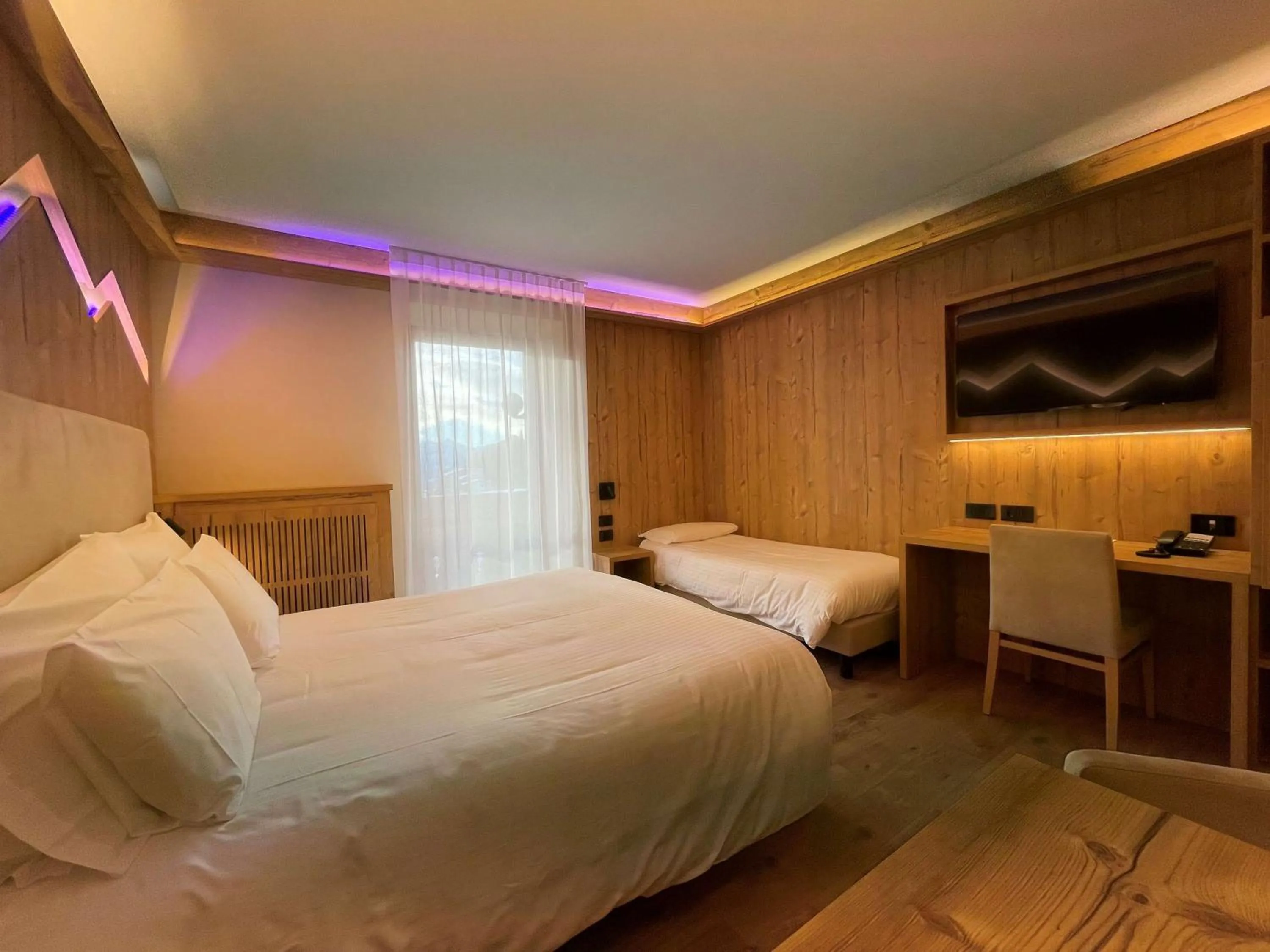 Bedroom, Bed in Hotel Cima Rosetta - BW Signature Collection