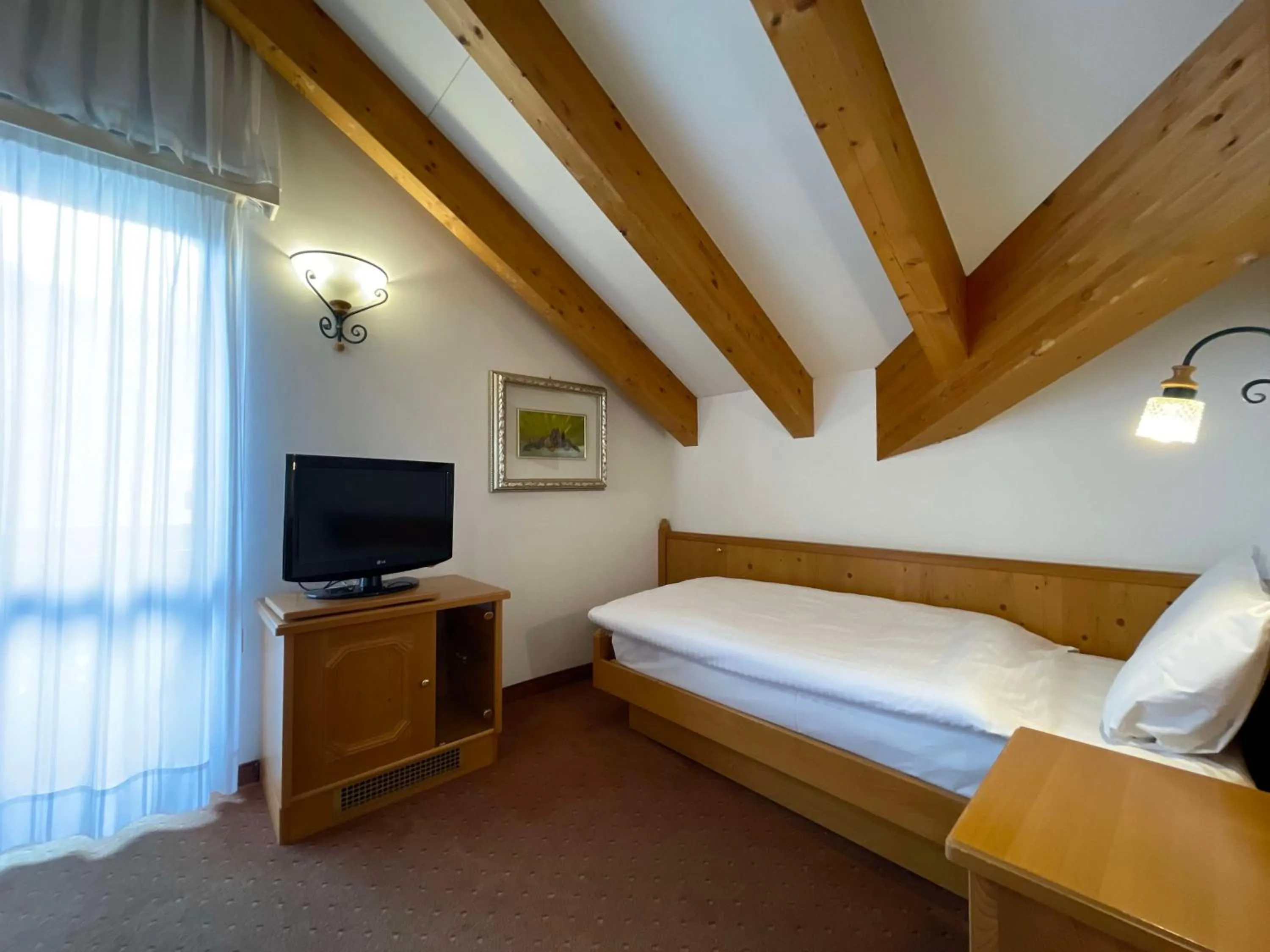 Bedroom, Bed in Hotel Cima Rosetta - BW Signature Collection