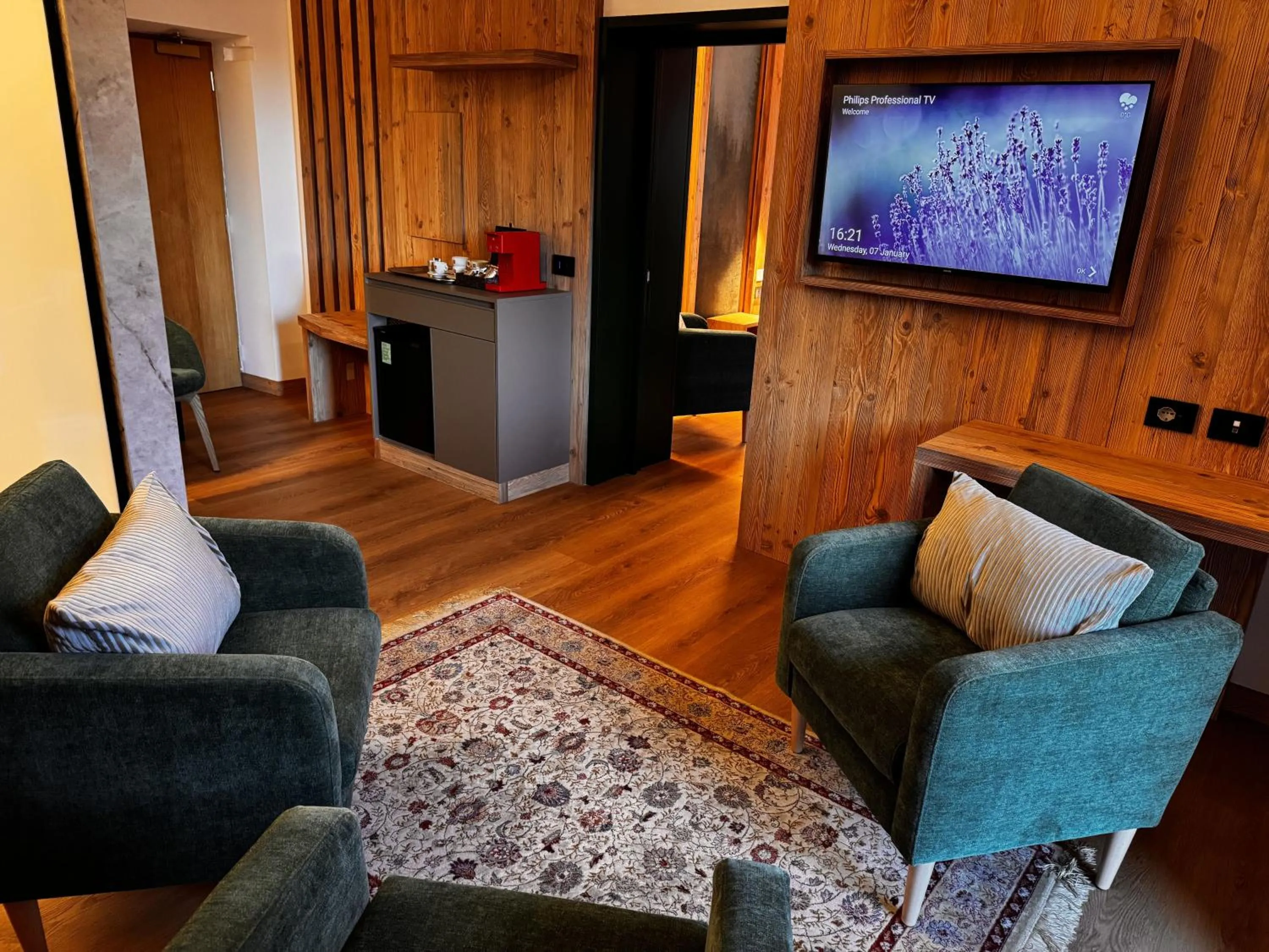 Communal lounge/ TV room in Hotel Cima Rosetta - BW Signature Collection