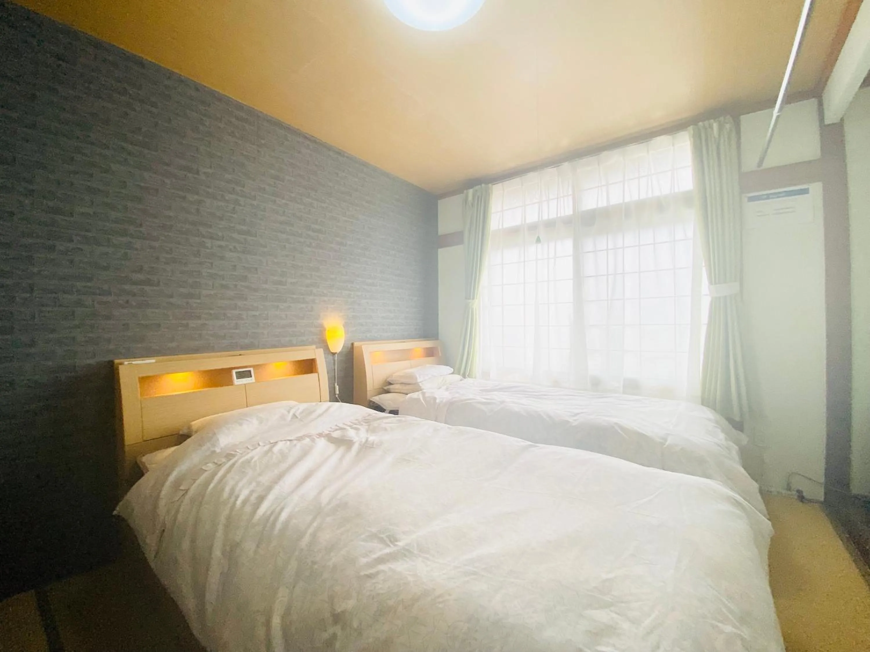 Bed in Ryokan Sansui