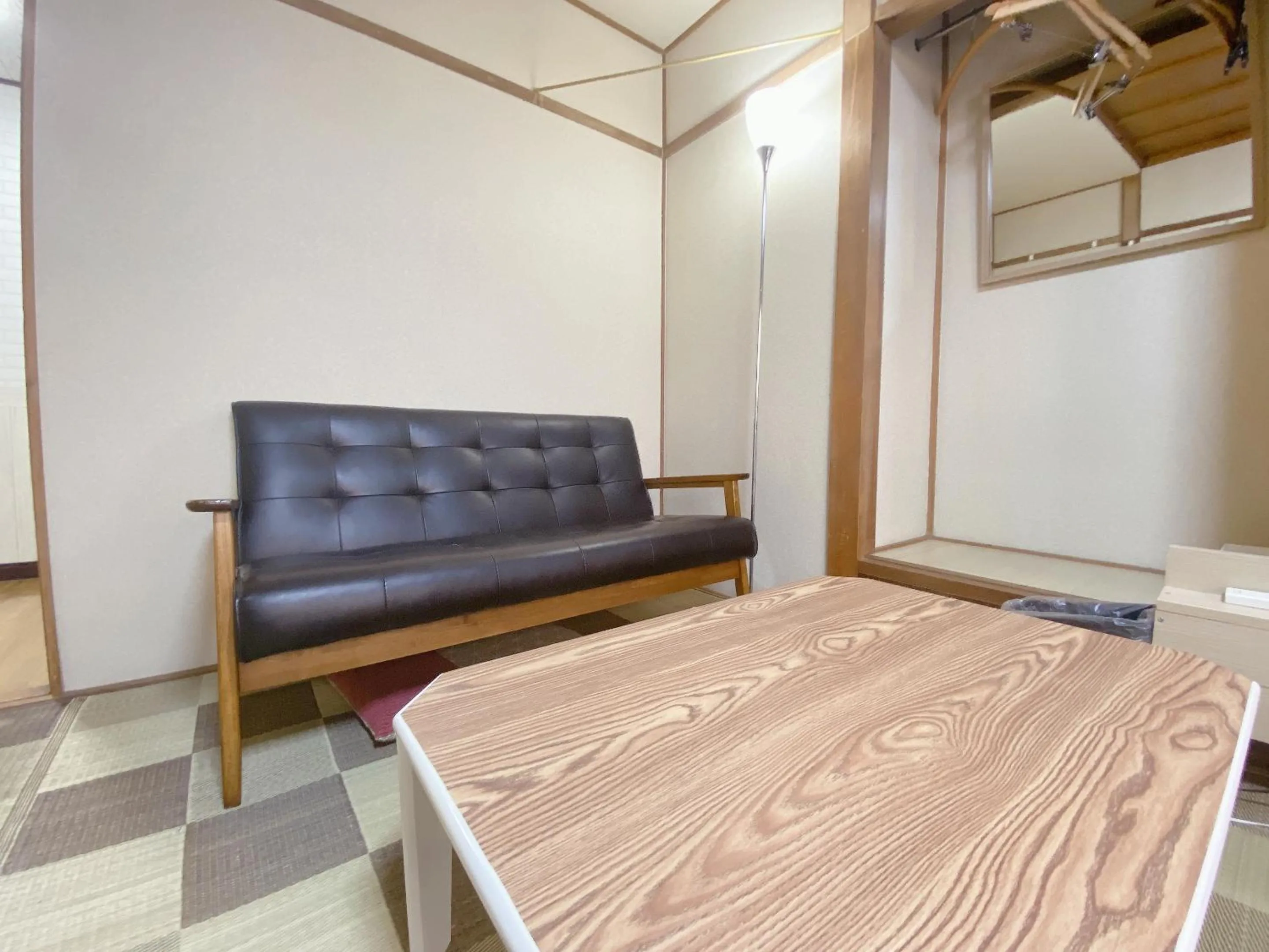 Seating area, Bed in Ryokan Sansui