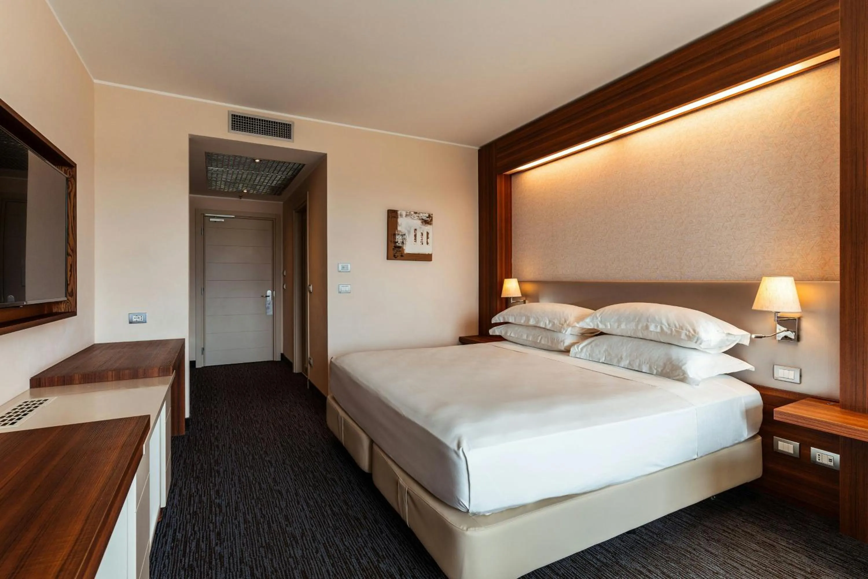 Photo of the whole room, Bed in Delta Hotels by Marriott Olbia Sardinia