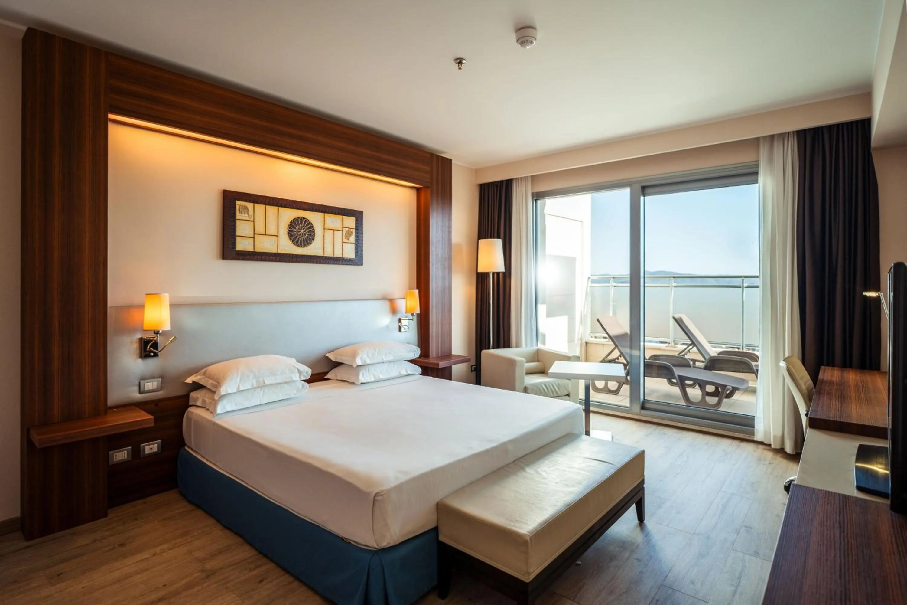 Photo of the whole room, Bed in Delta Hotels by Marriott Olbia Sardinia