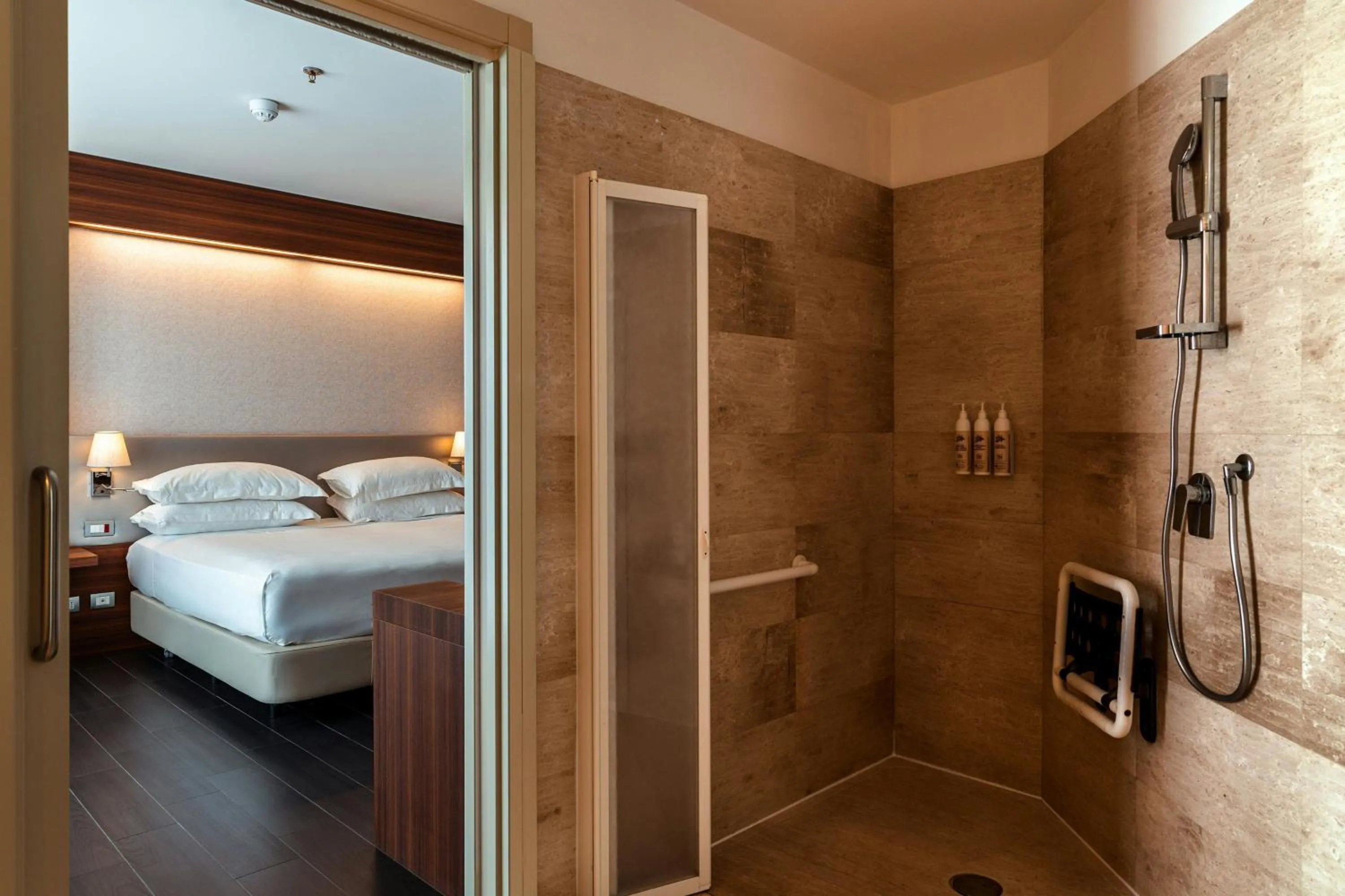Bathroom, Bed in Delta Hotels by Marriott Olbia Sardinia
