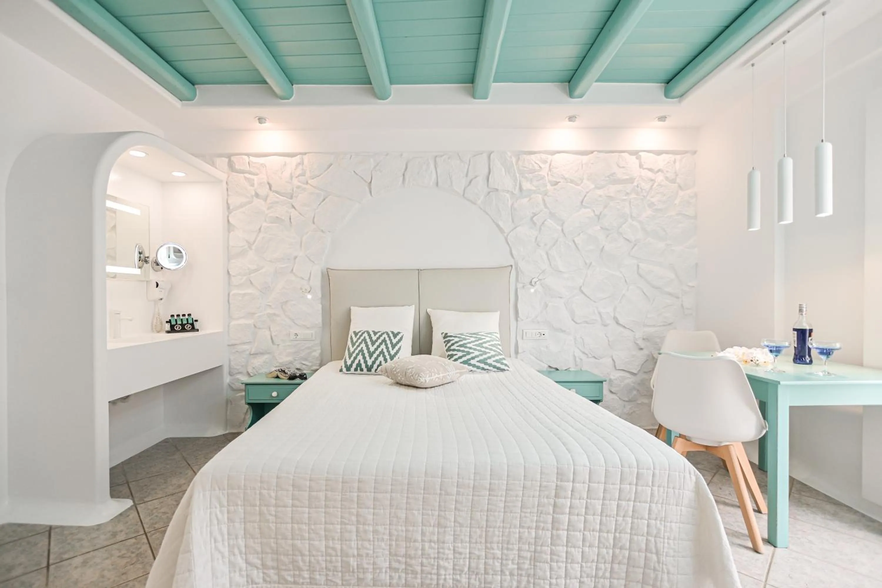 Bed in Naxos Evilion Luxury Apartments & Suites