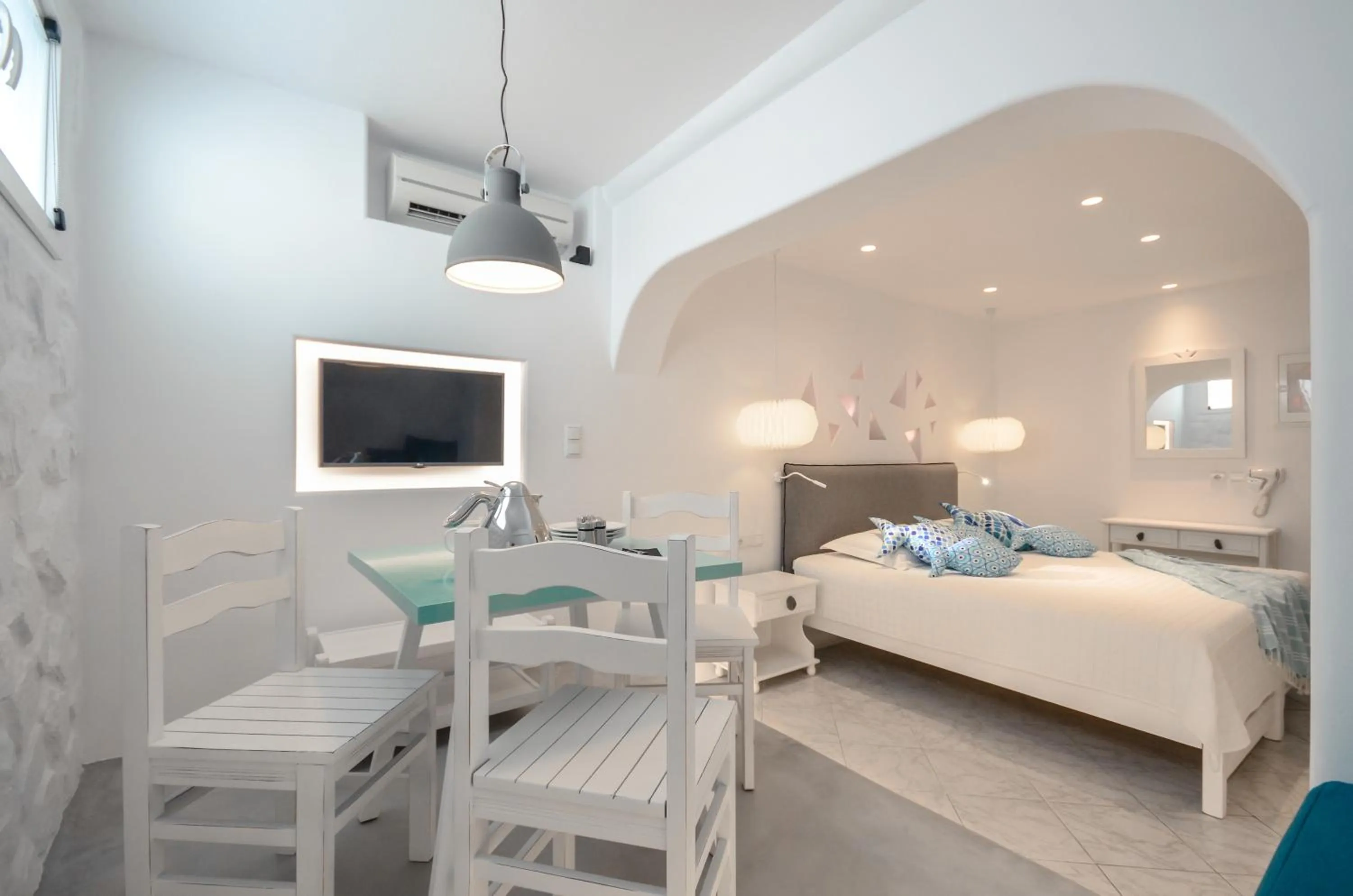 Decorative detail, Bed in Naxos Evilion Luxury Apartments & Suites