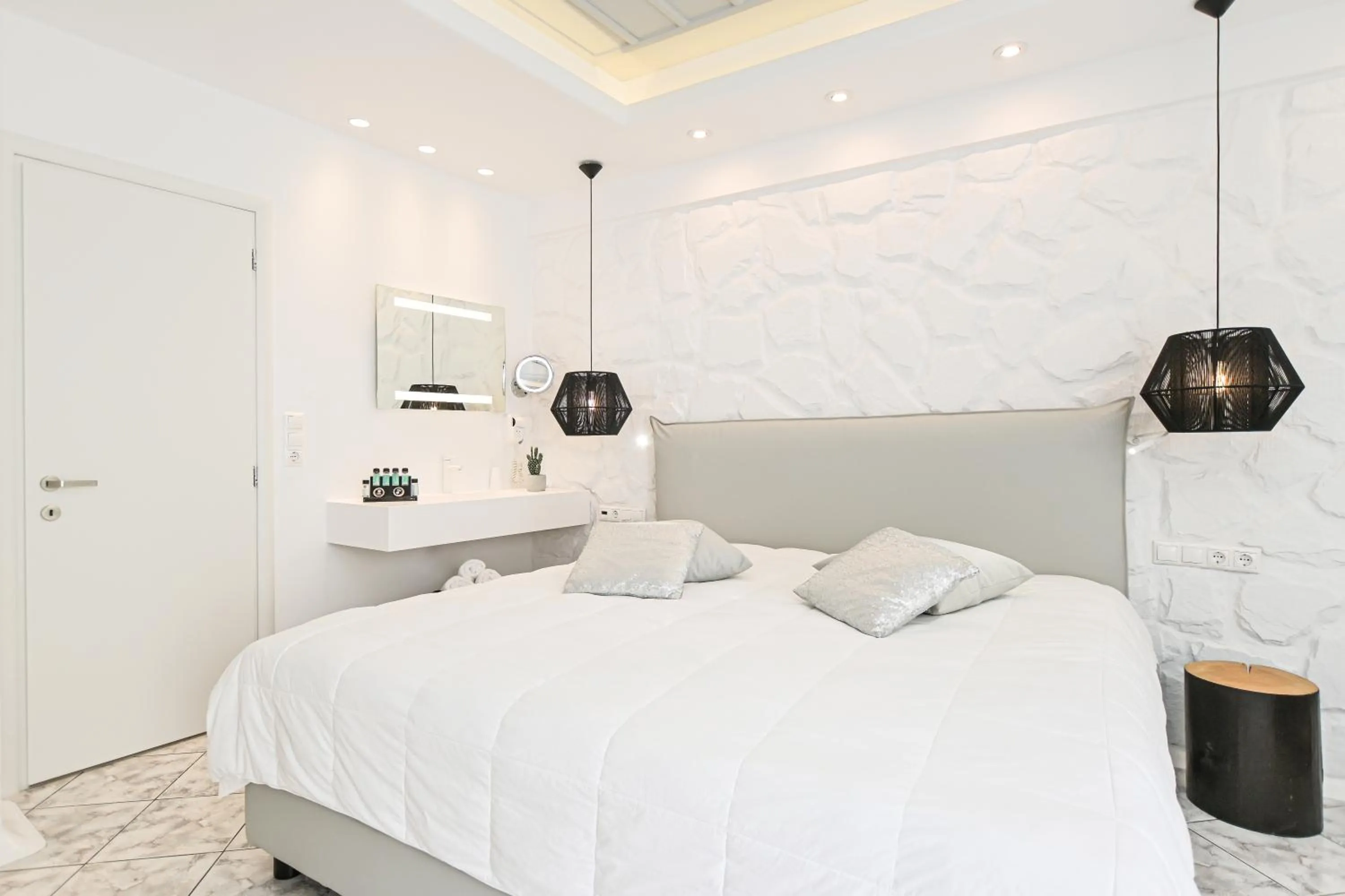 Bed in Naxos Evilion Luxury Apartments & Suites