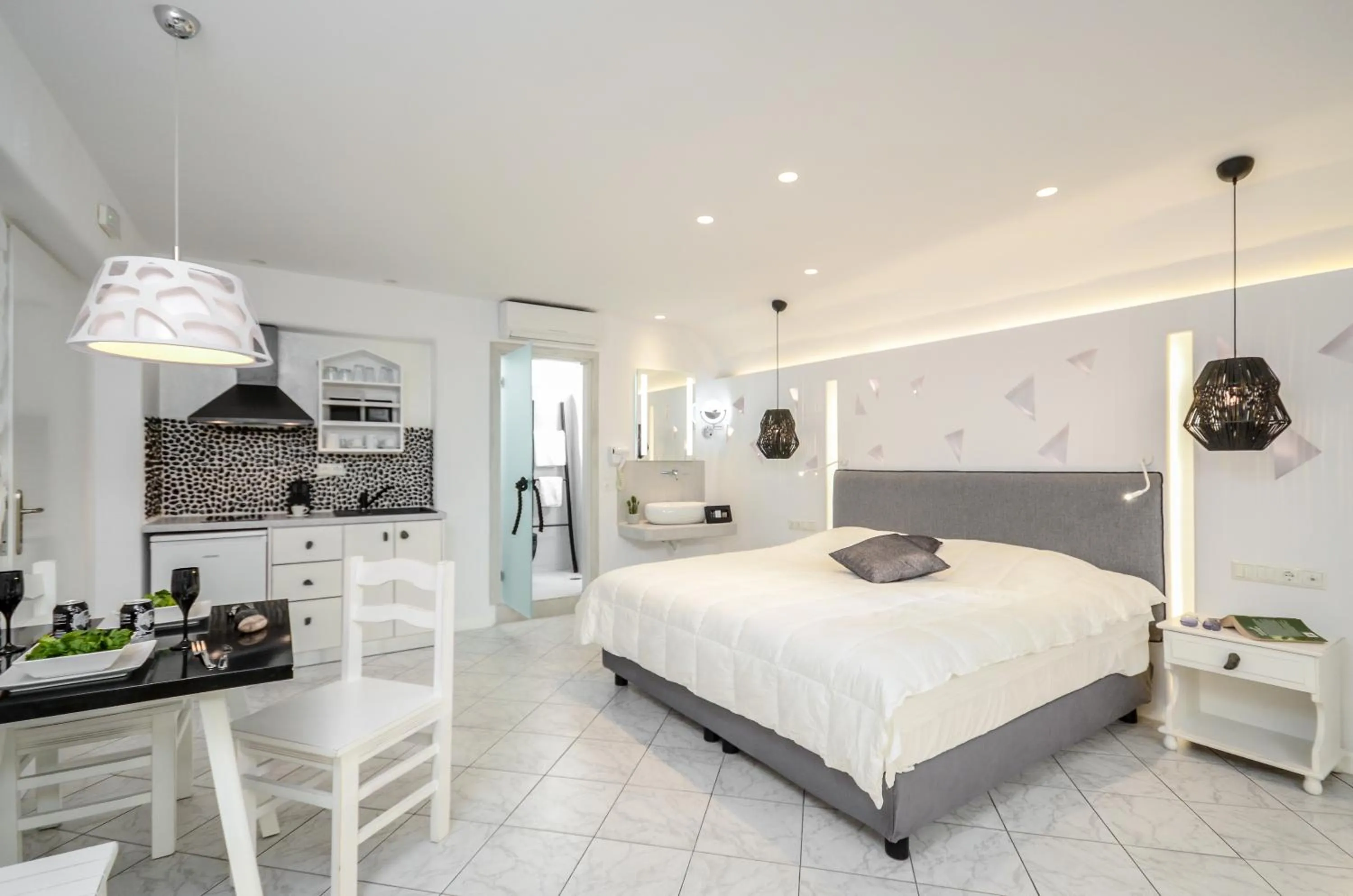 Bed in Naxos Evilion Luxury Apartments & Suites