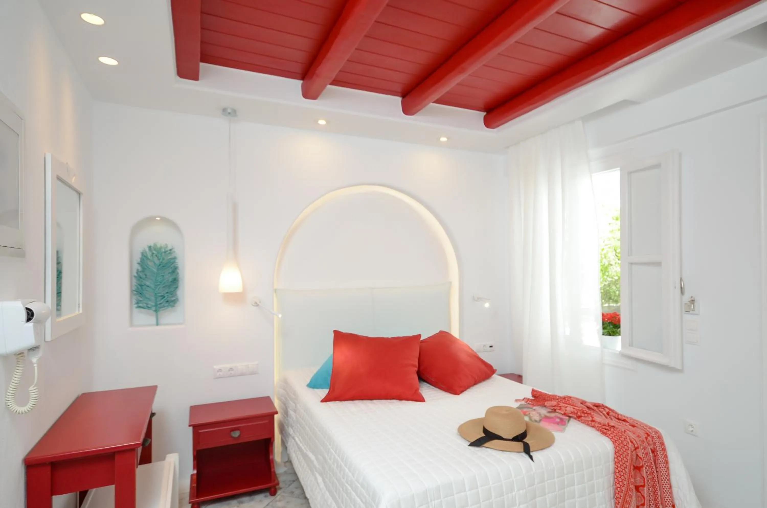 Photo of the whole room, Bed in Naxos Evilion Luxury Apartments & Suites