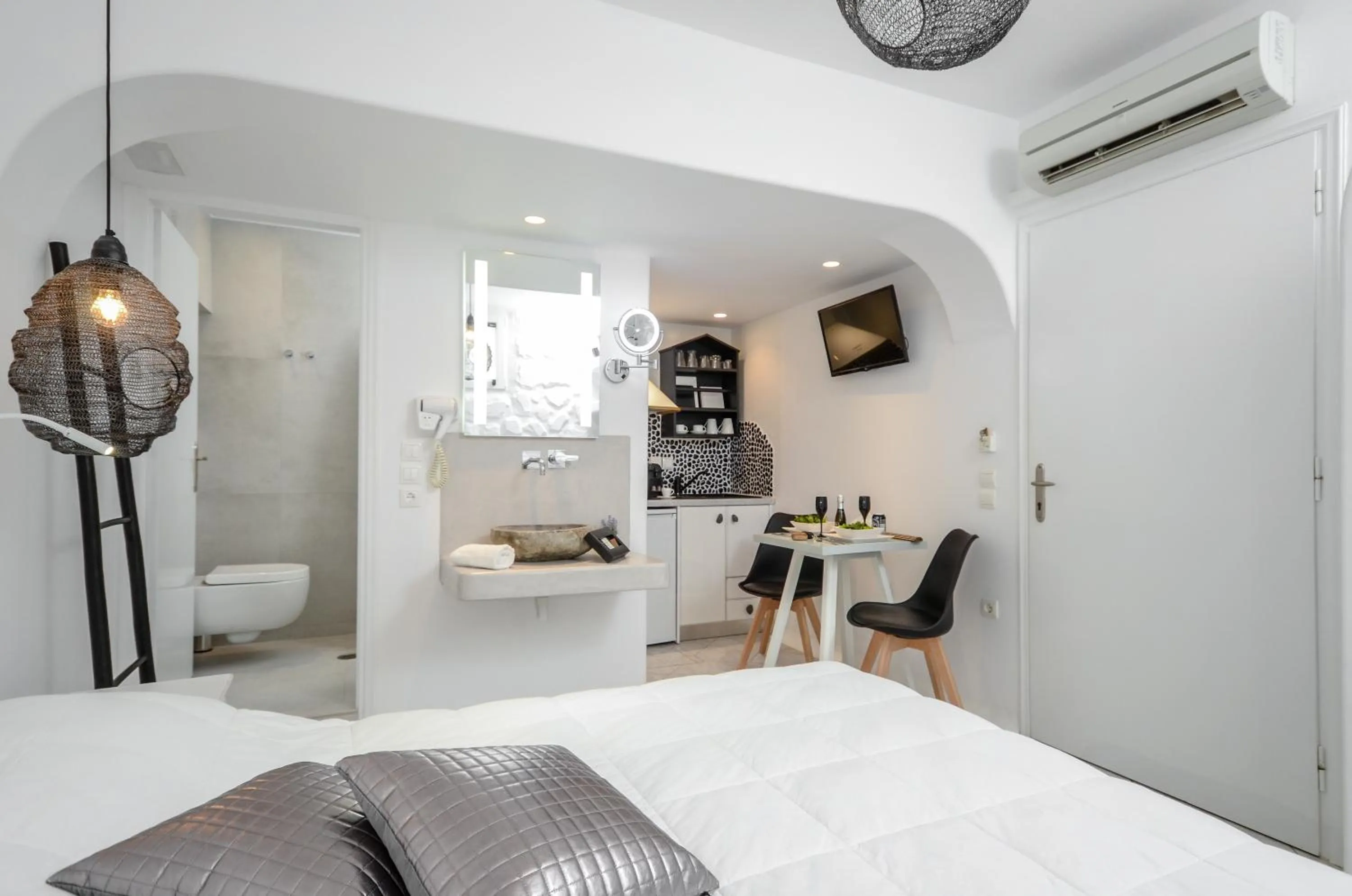 Bed in Naxos Evilion Luxury Apartments & Suites
