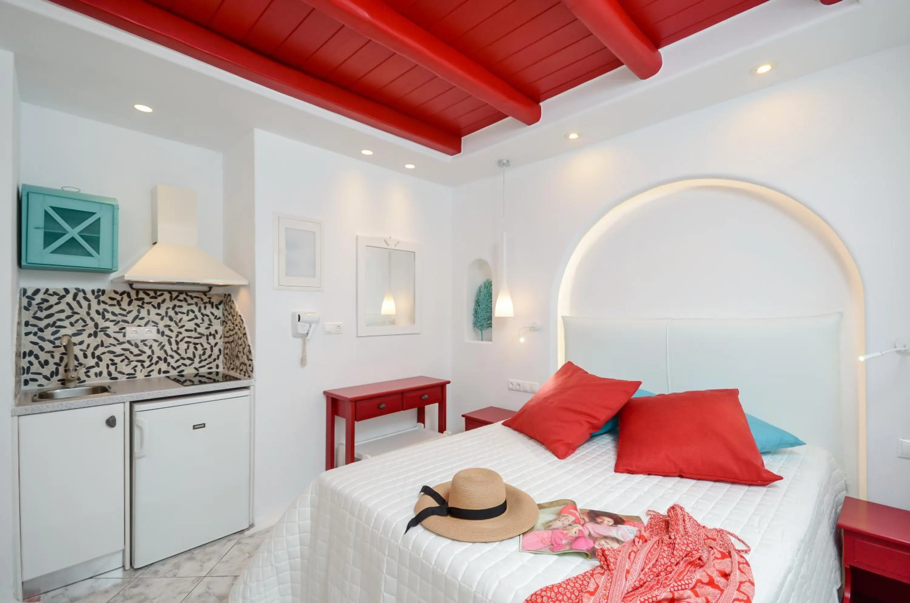 Photo of the whole room, Bed in Naxos Evilion Luxury Apartments & Suites