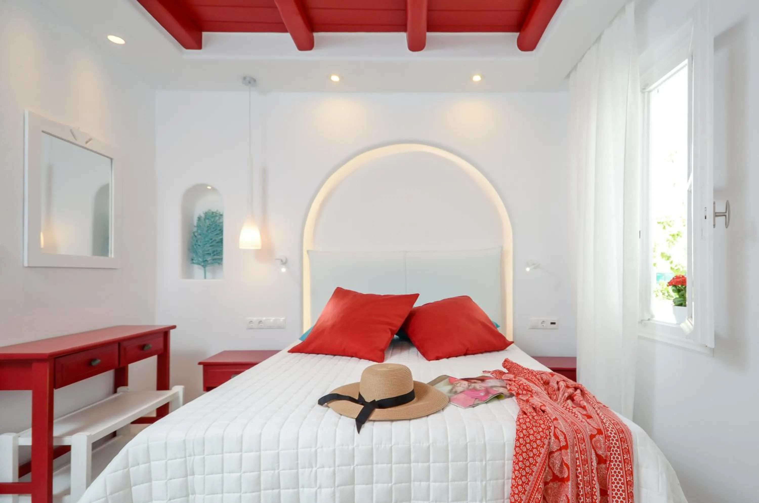 Photo of the whole room, Bed in Naxos Evilion Luxury Apartments & Suites