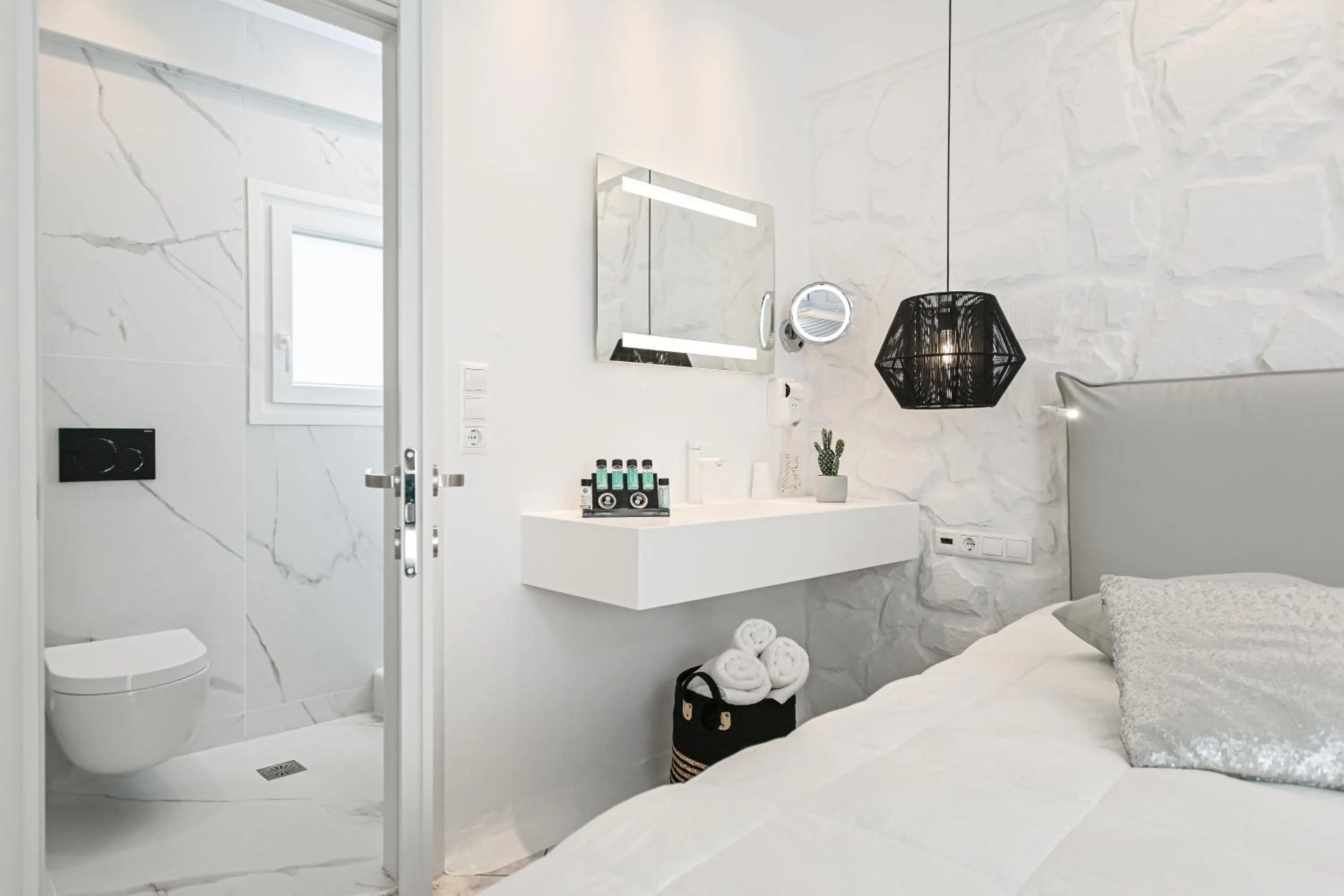 Bed in Naxos Evilion Luxury Apartments & Suites