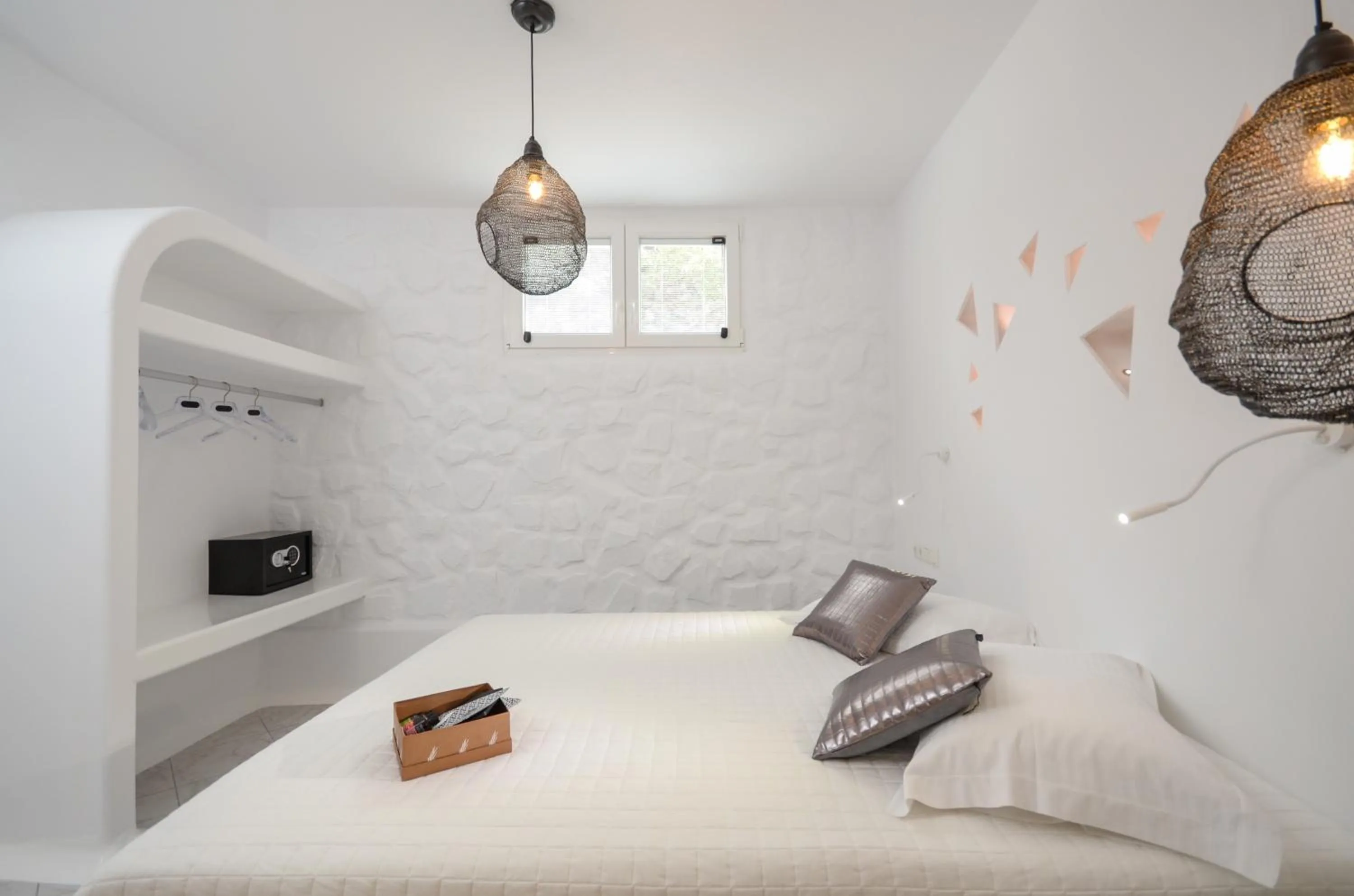 Decorative detail, Bed in Naxos Evilion Luxury Apartments & Suites