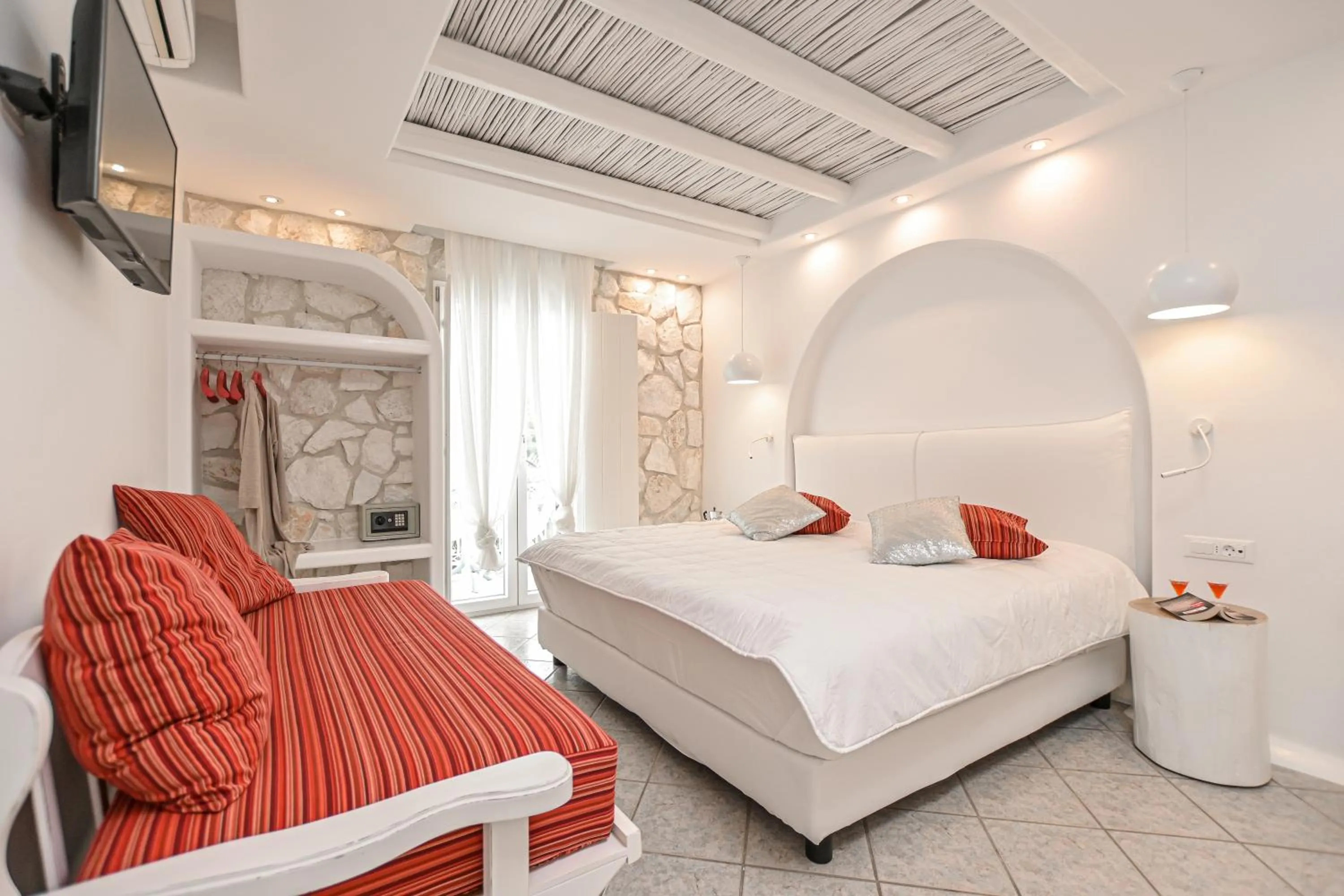 Bed in Naxos Evilion Luxury Apartments & Suites