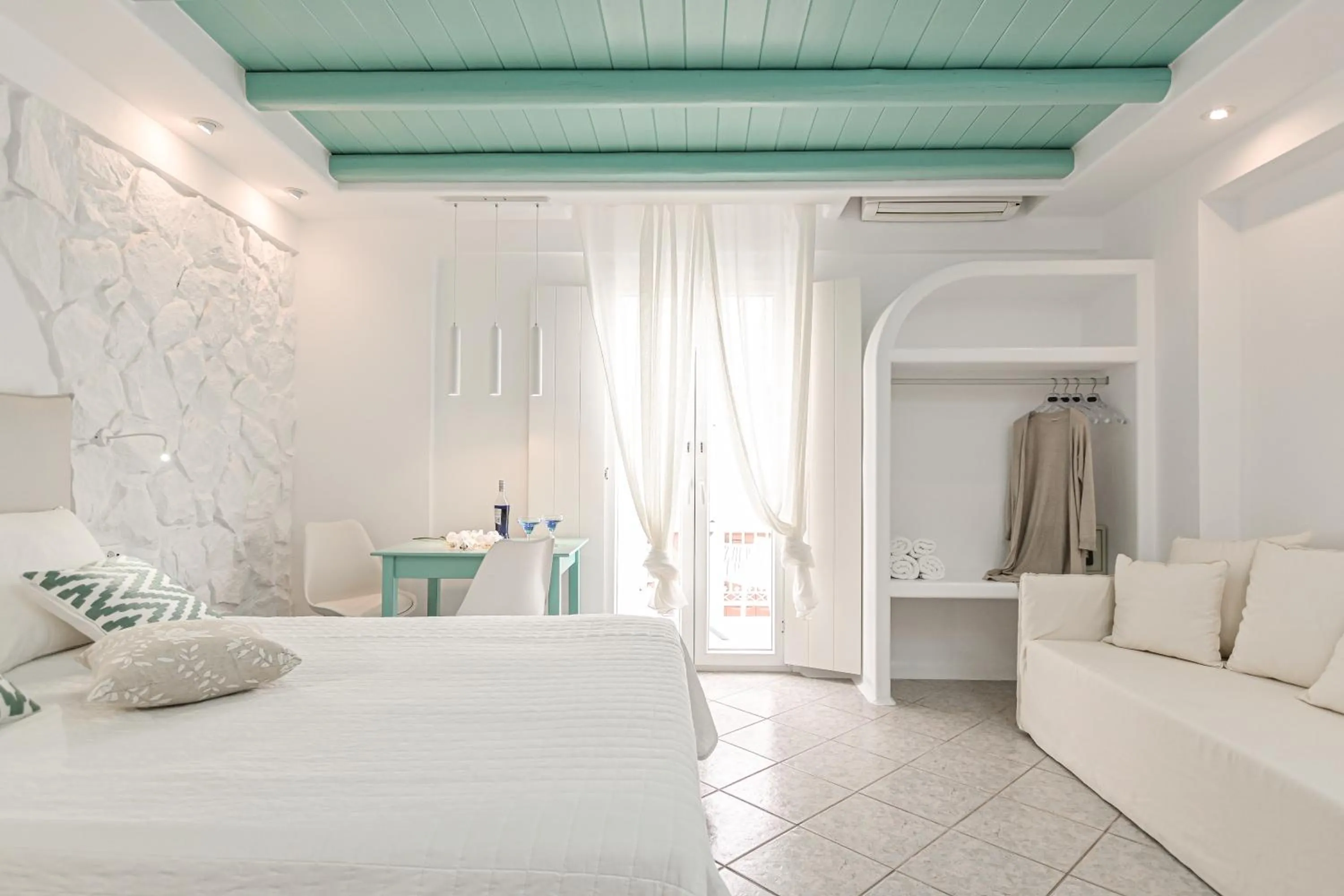 Bed in Naxos Evilion Luxury Apartments & Suites