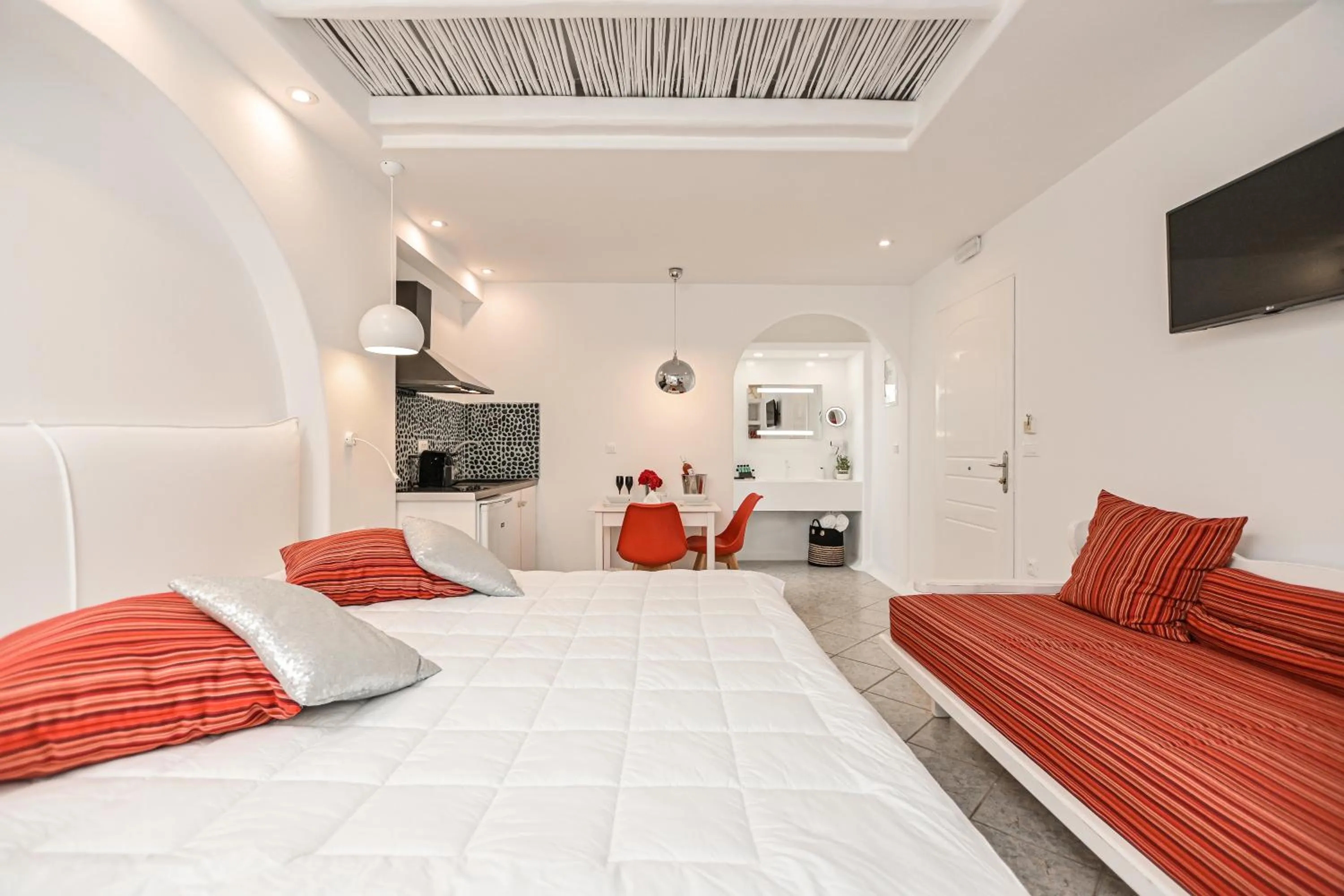 Bed in Naxos Evilion Luxury Apartments & Suites