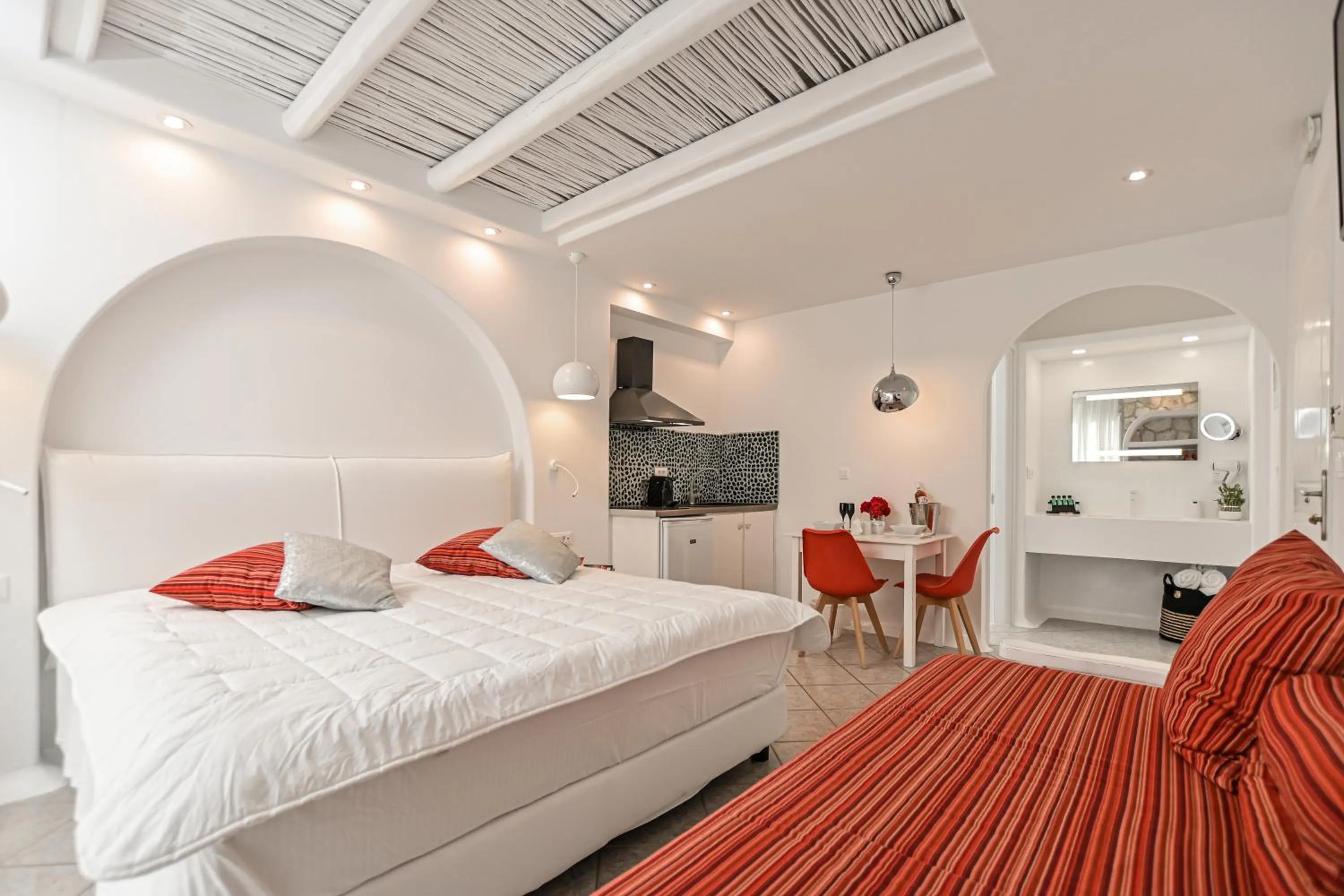 Bed in Naxos Evilion Luxury Apartments & Suites