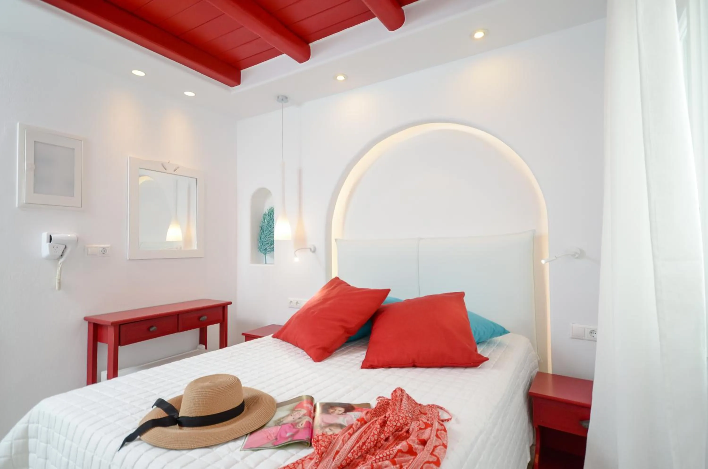 Photo of the whole room, Bed in Naxos Evilion Luxury Apartments & Suites