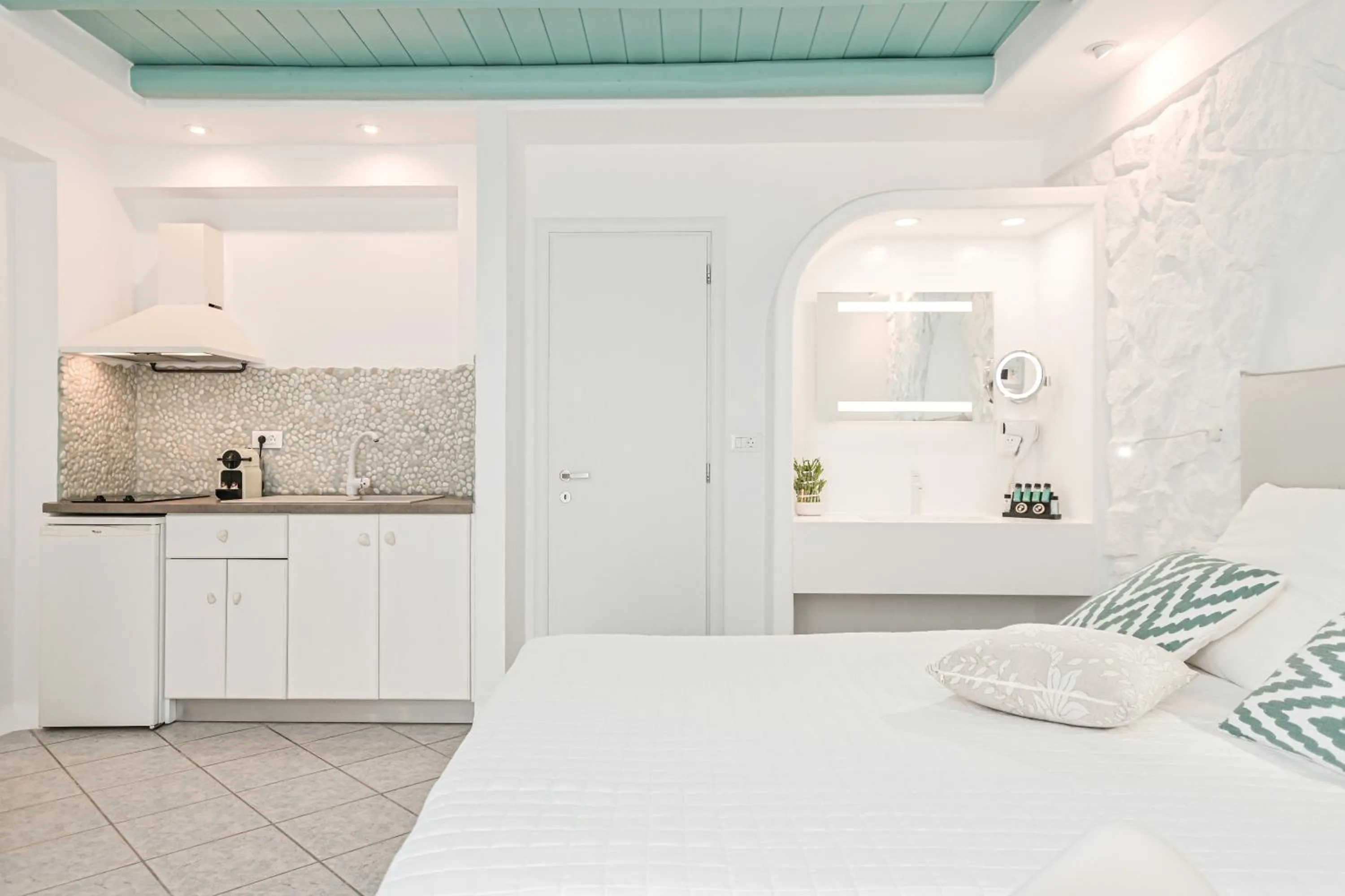 Bed in Naxos Evilion Luxury Apartments & Suites