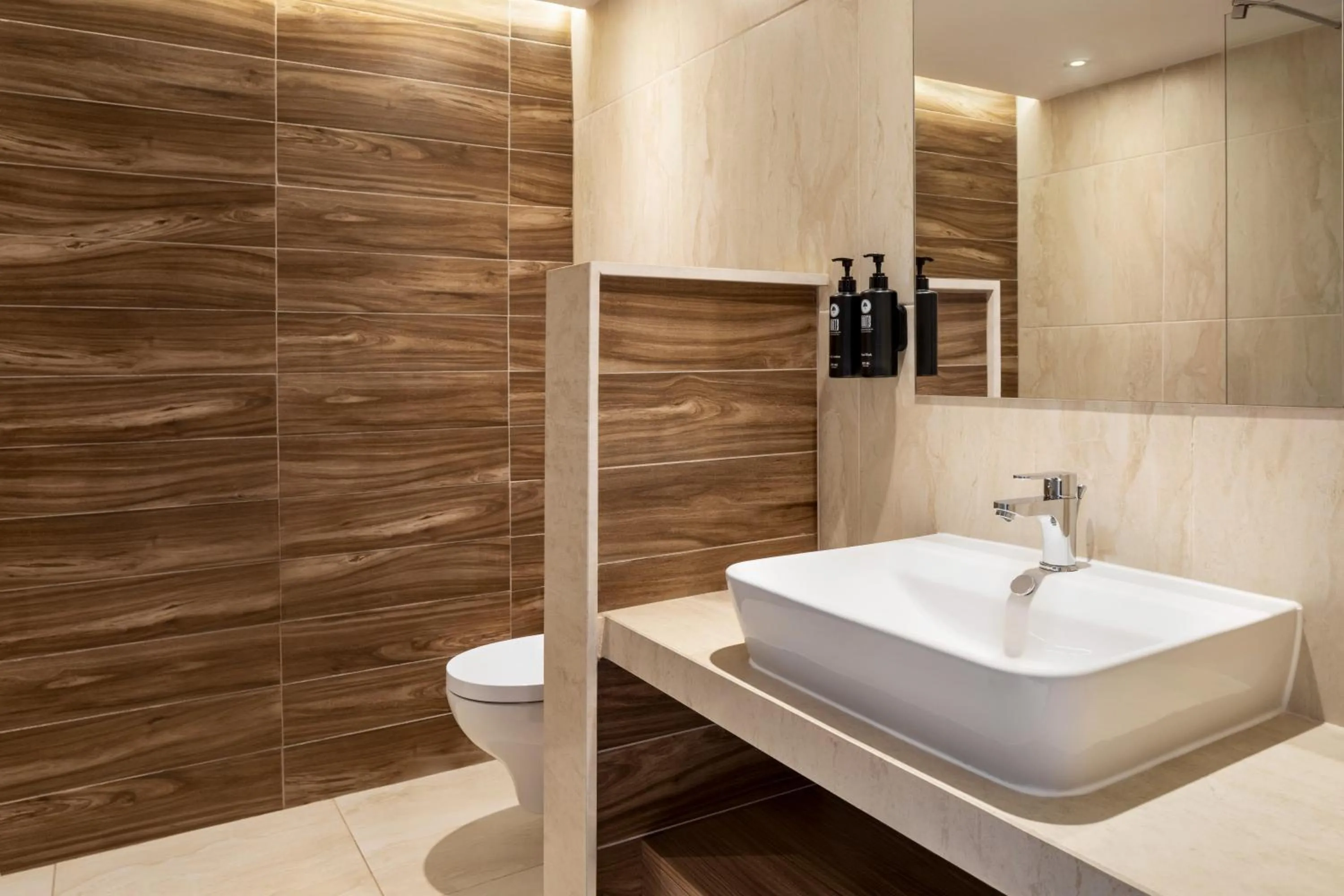 Bathroom in Ramada Hotel & Suites by Wyndham Ayia Napa