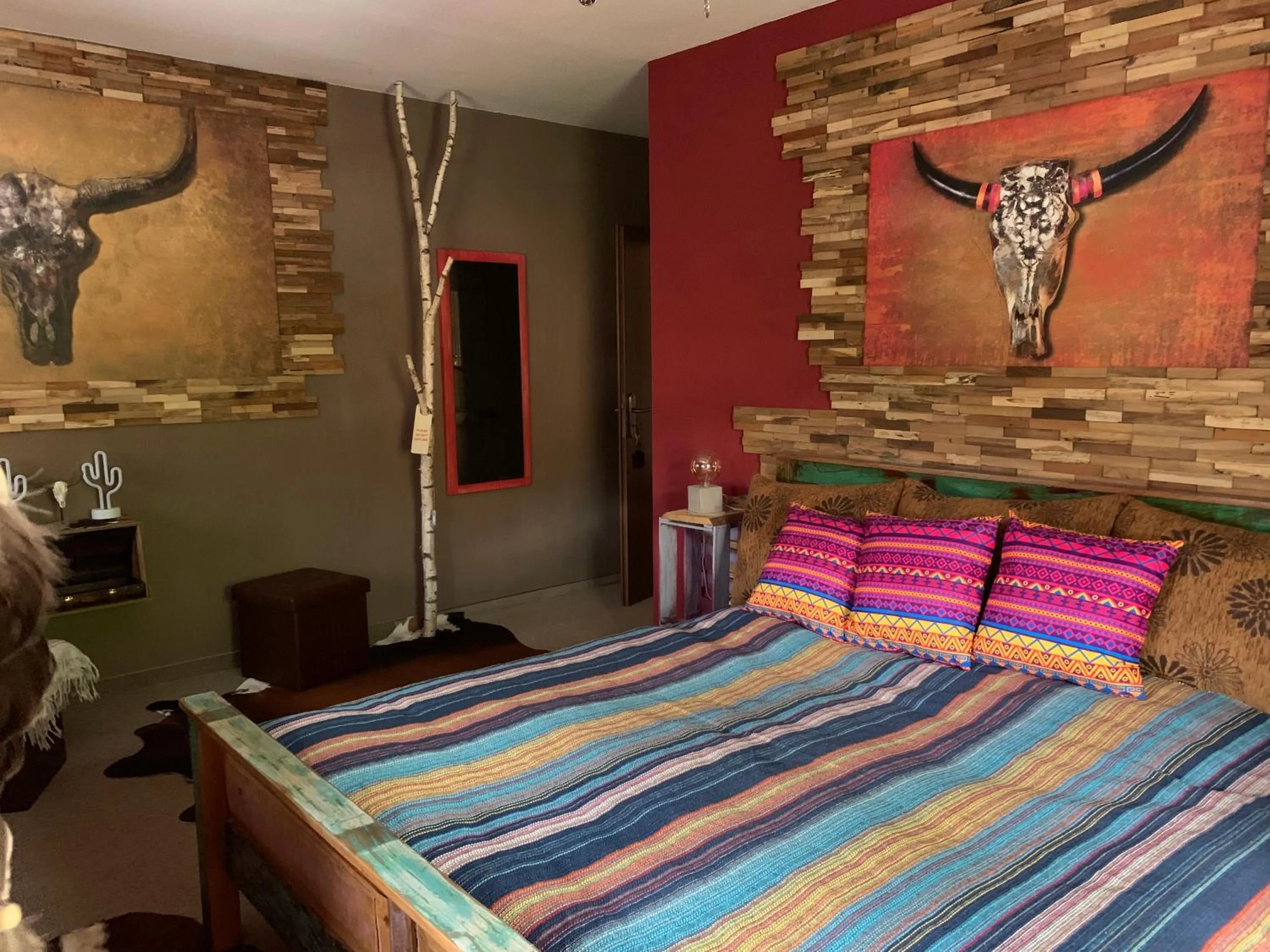 Bedroom in Longhorn Ranch Countryhotel - Garni