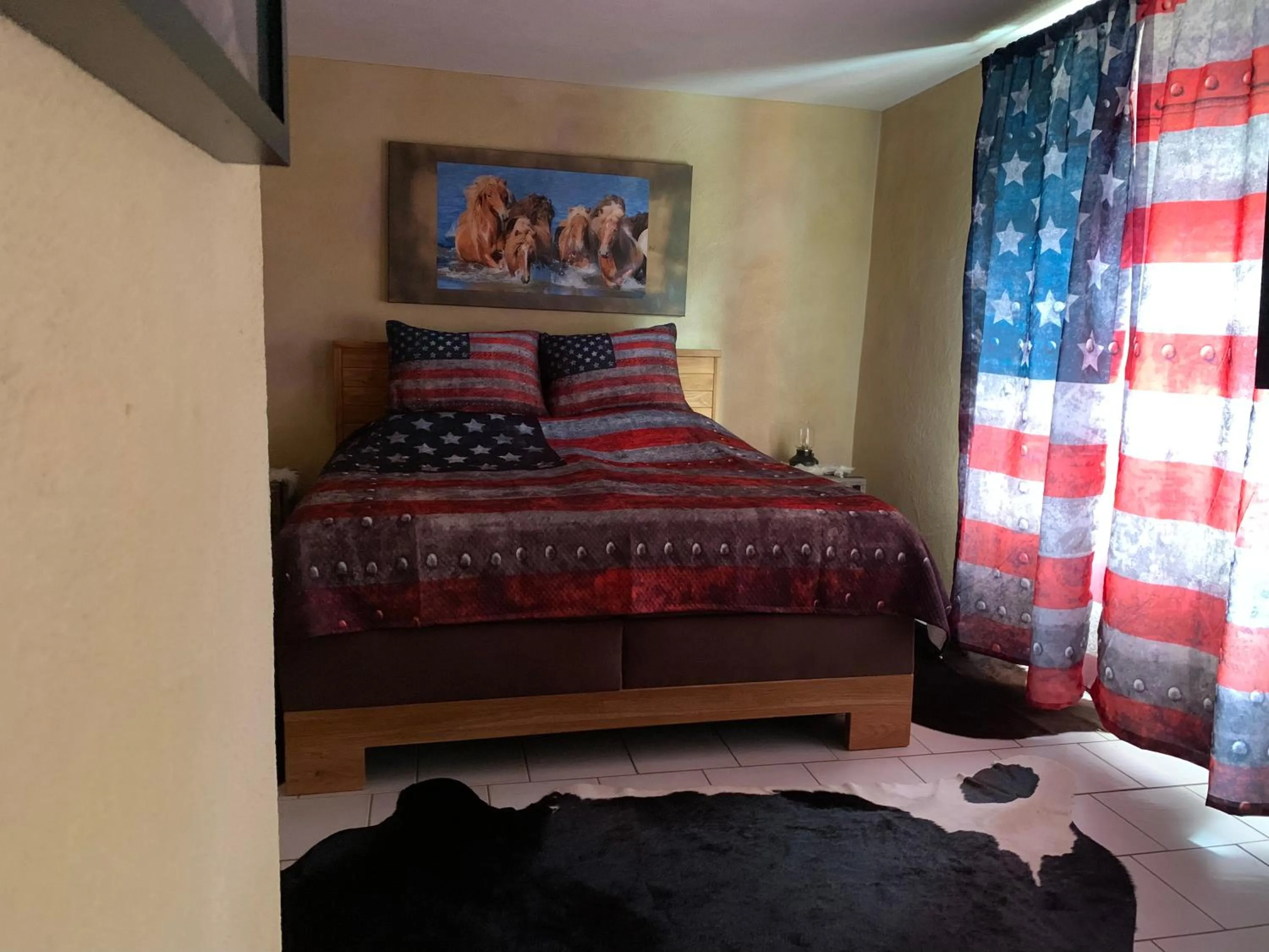 Bed in Longhorn Ranch Countryhotel - Garni