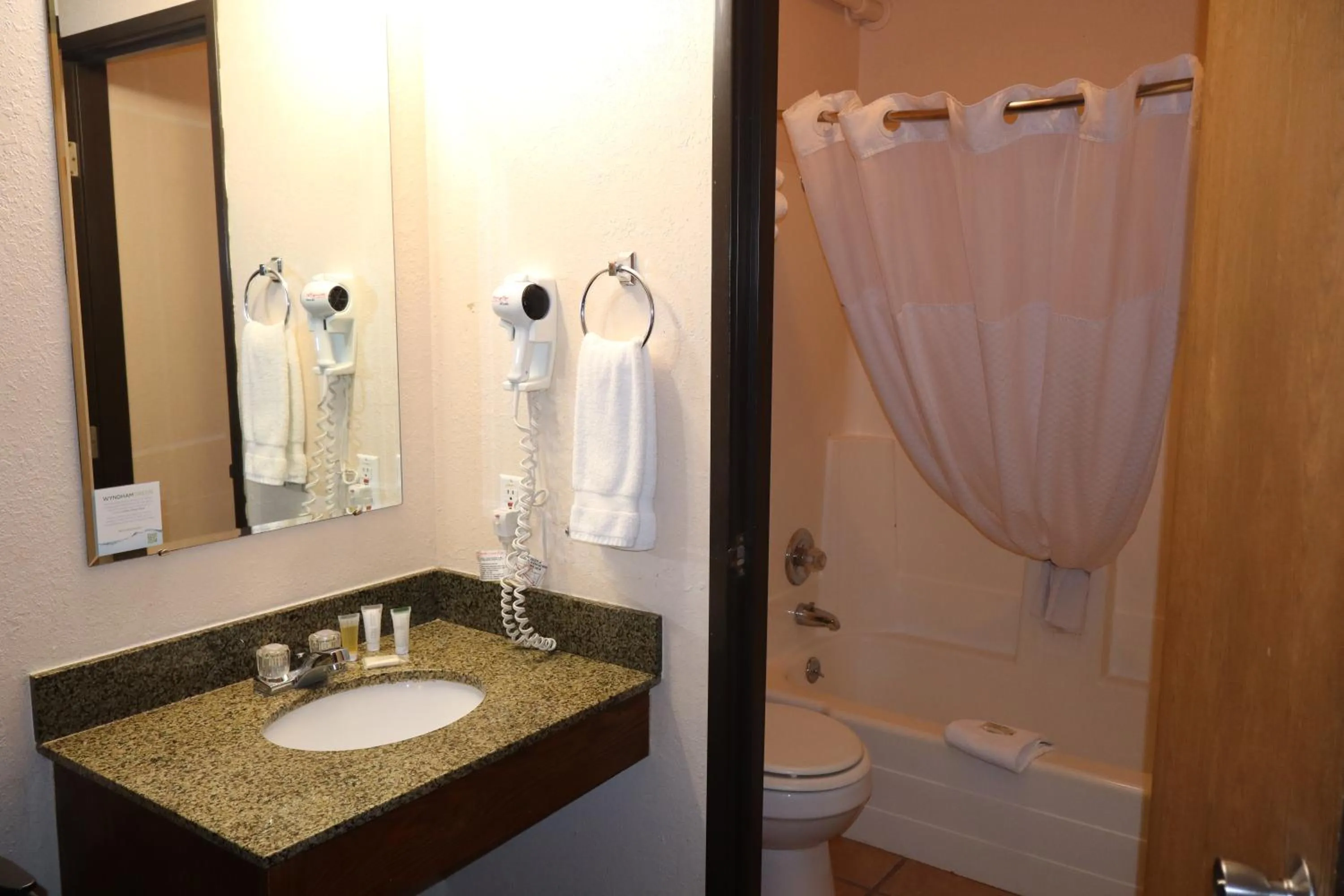 Bathroom in Super 8 by Wyndham Rapid City