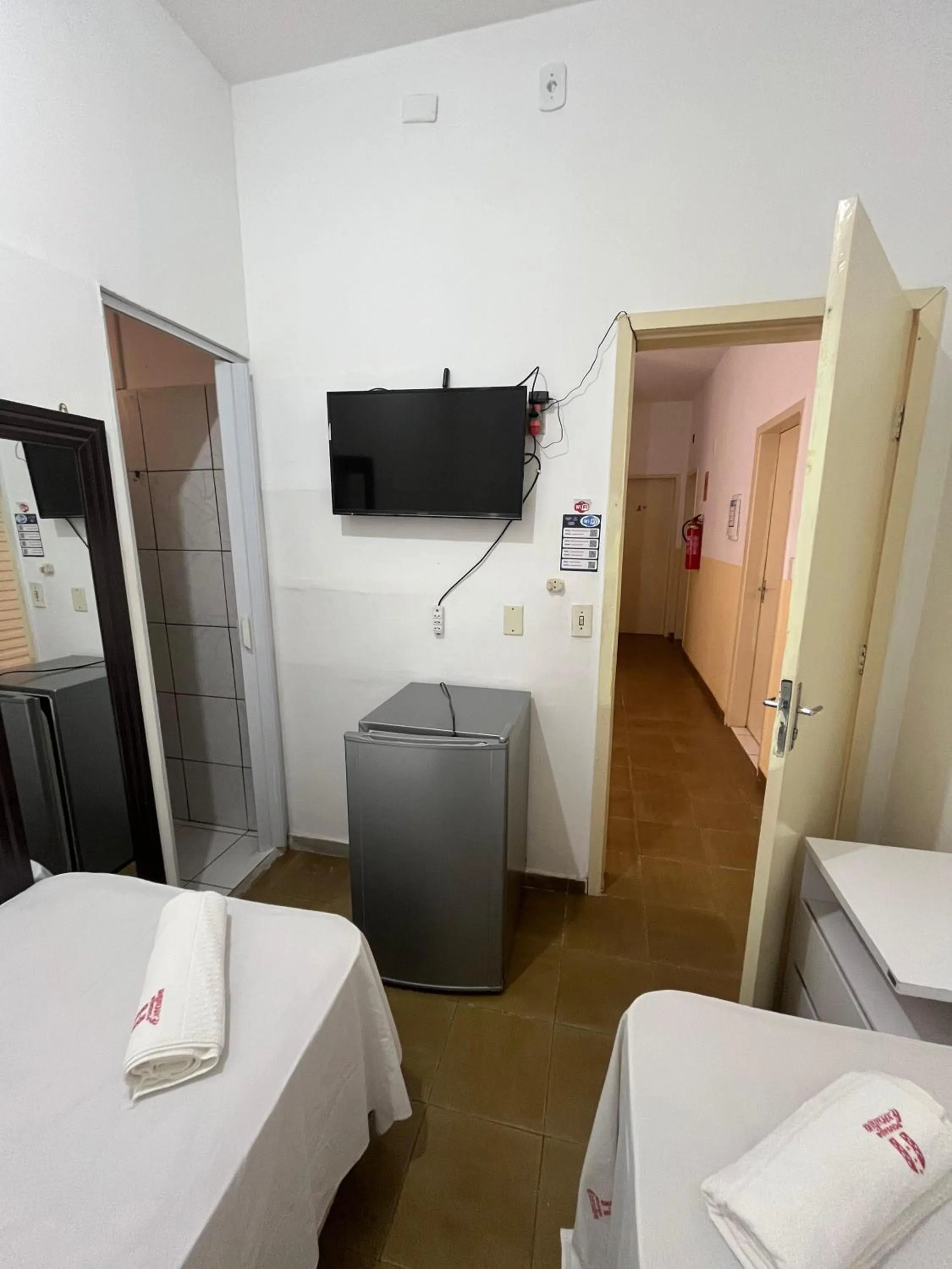 Bed in Pousada Executiva