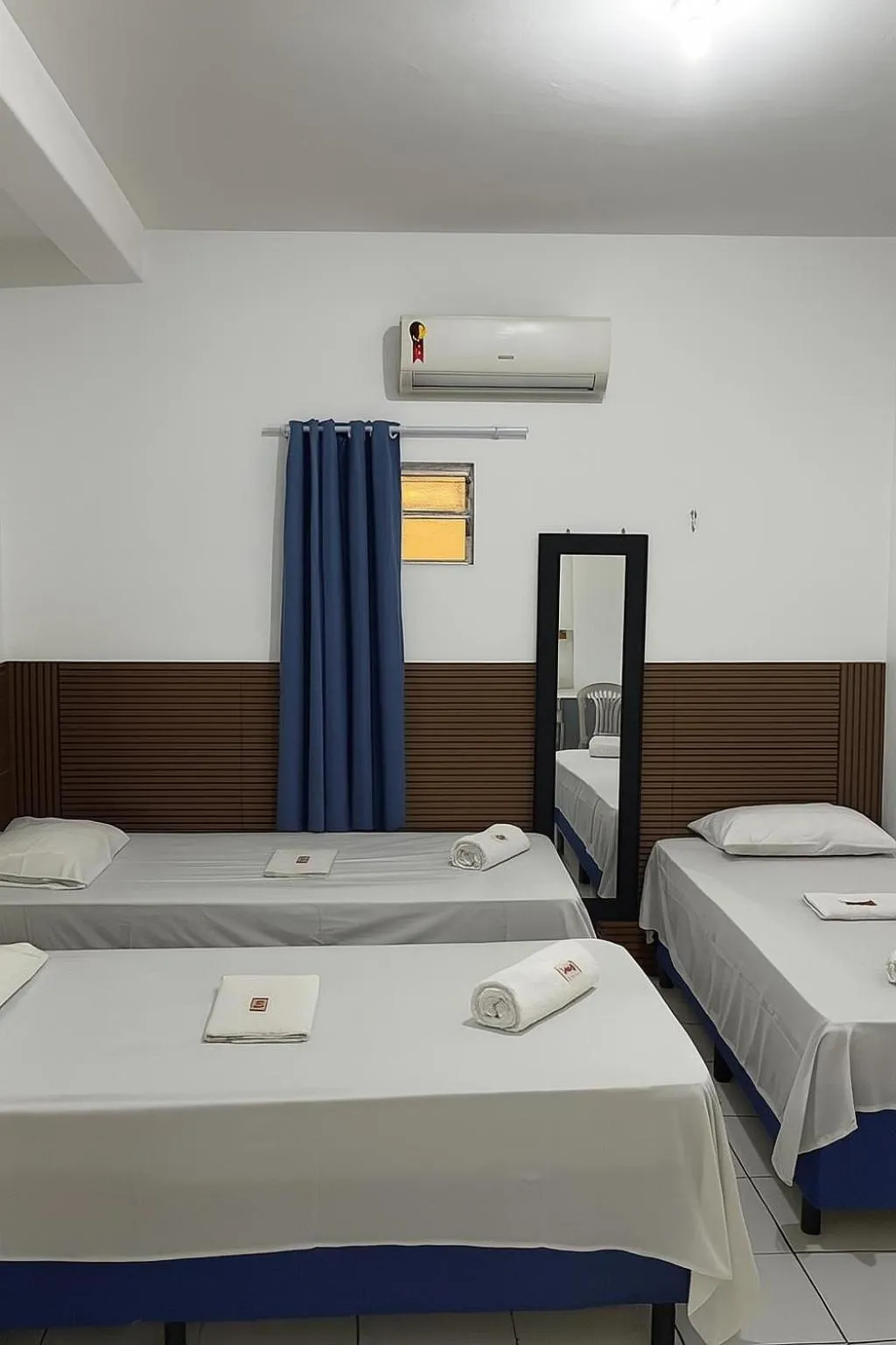 Bed in Pousada Executiva