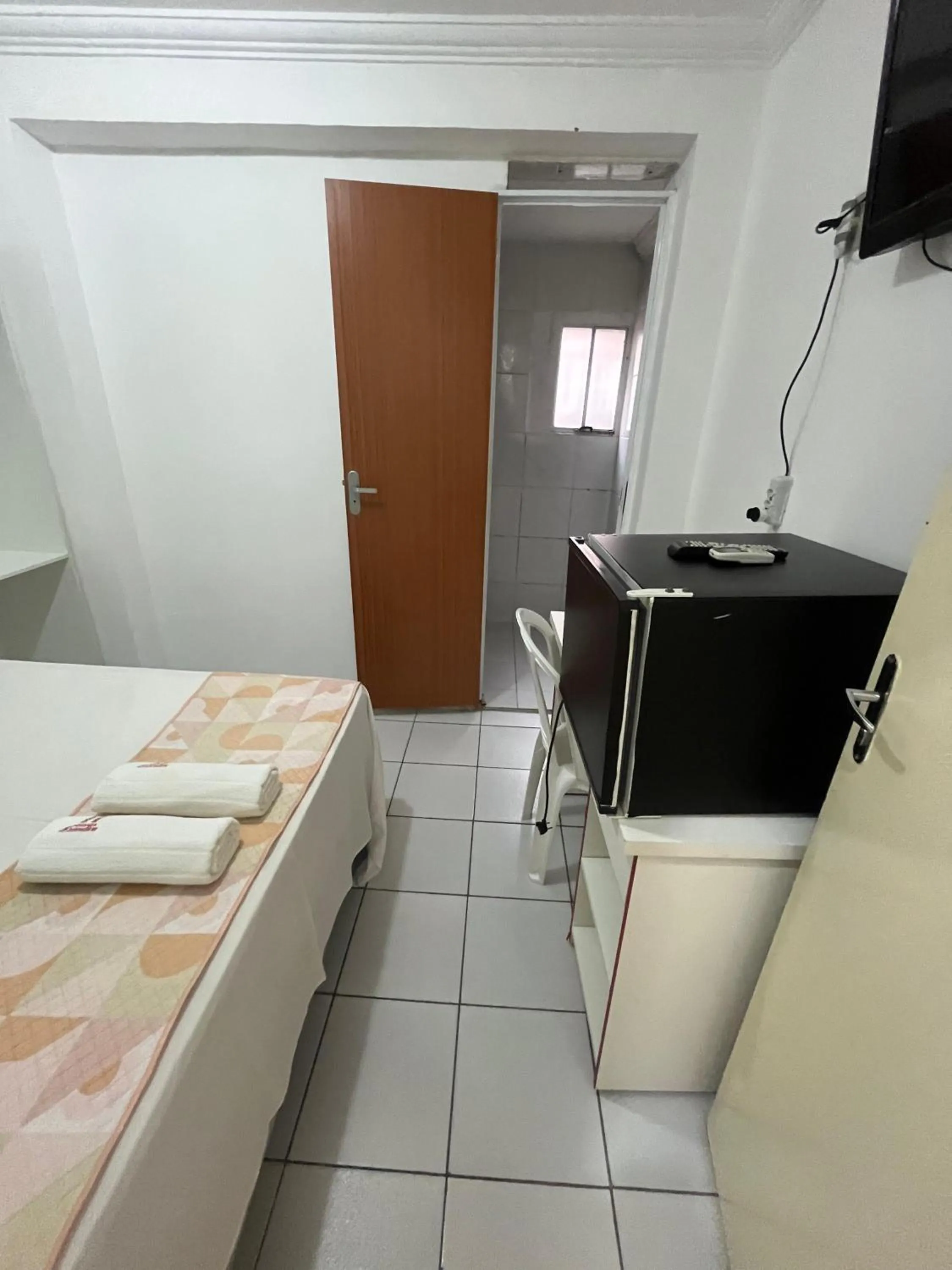 Bed in Pousada Executiva