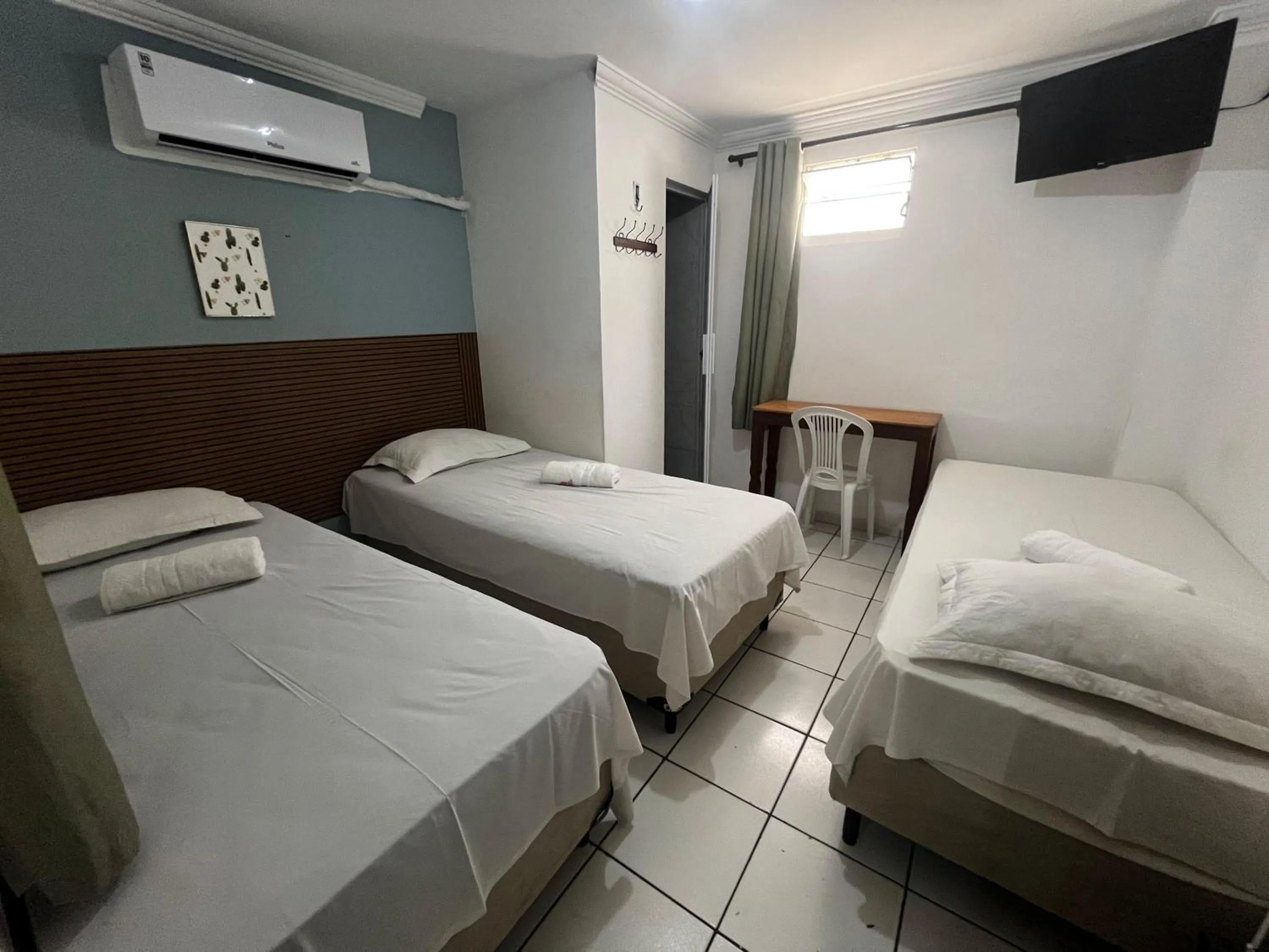 Bed in Pousada Executiva