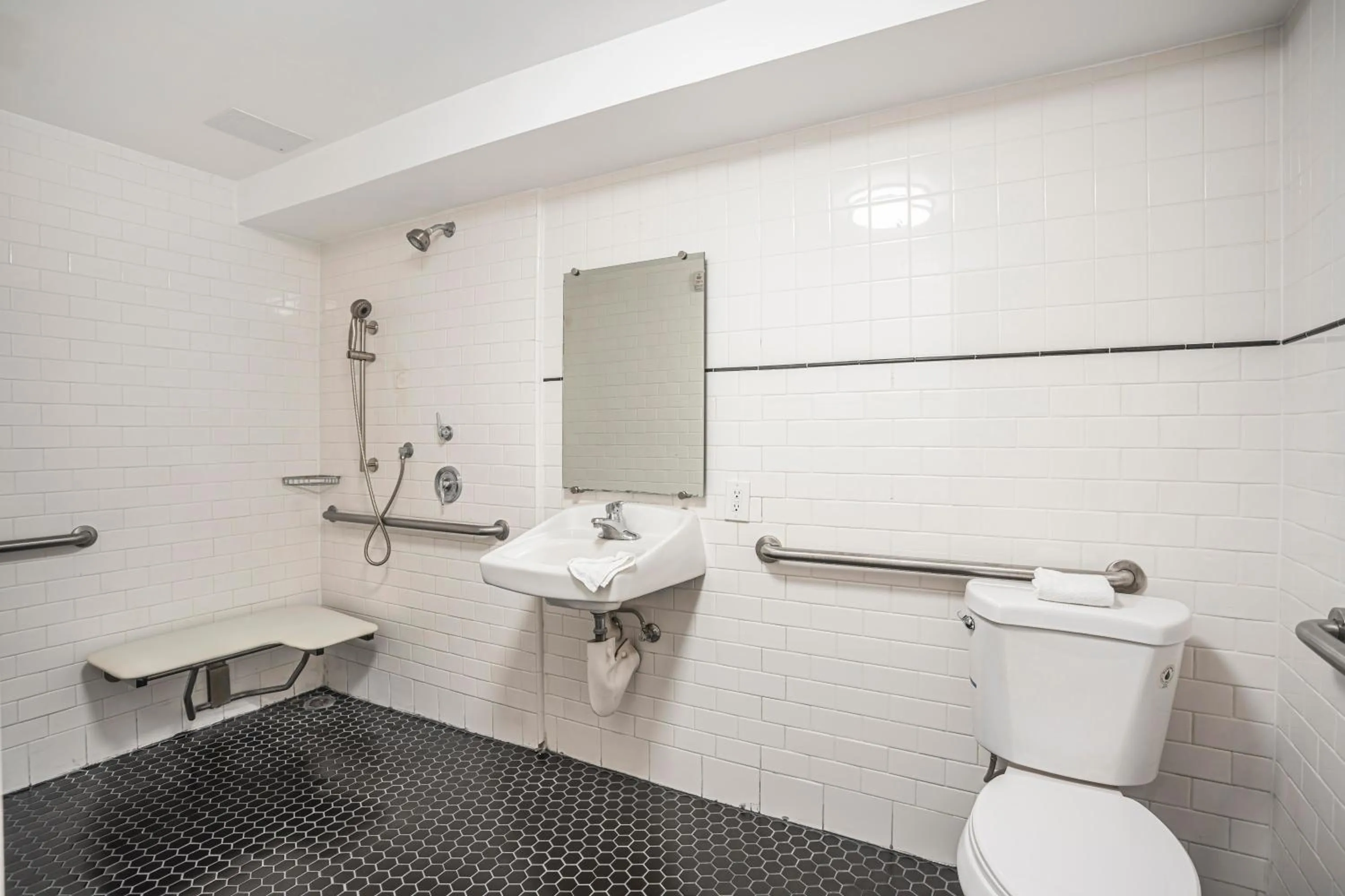 Bathroom in The Greens Hotel on Del Paso