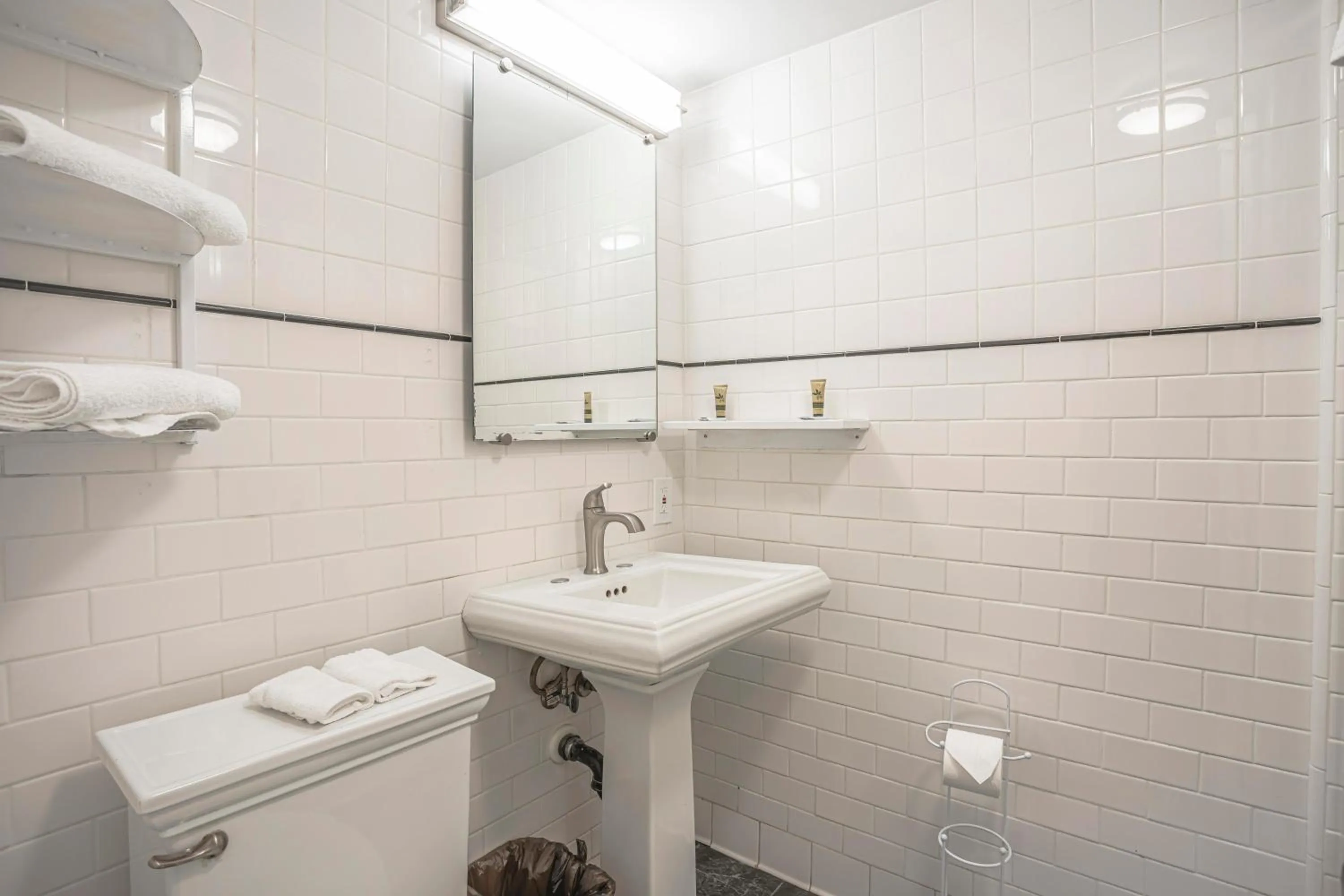 Bathroom in The Greens Hotel on Del Paso