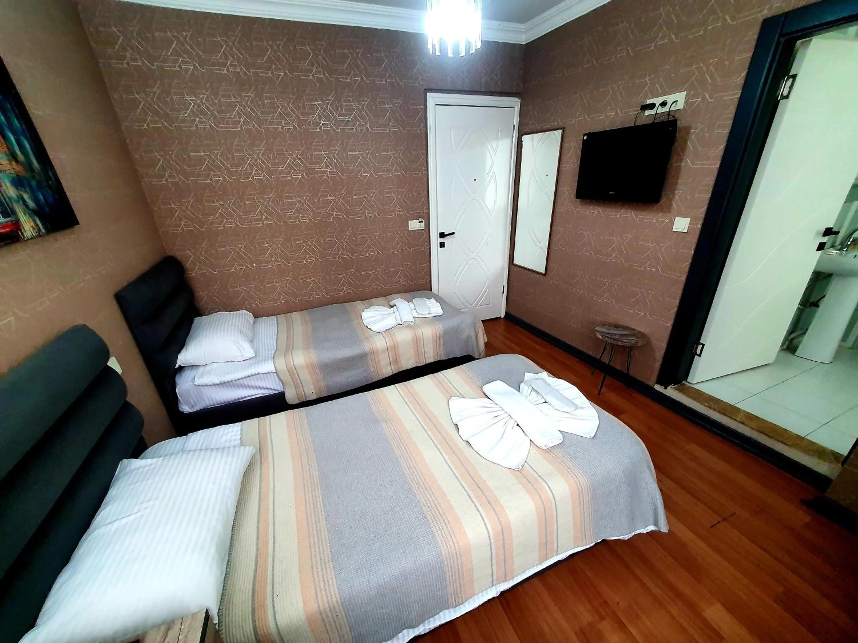TV and multimedia, Bed in Omega Luxx Hotel