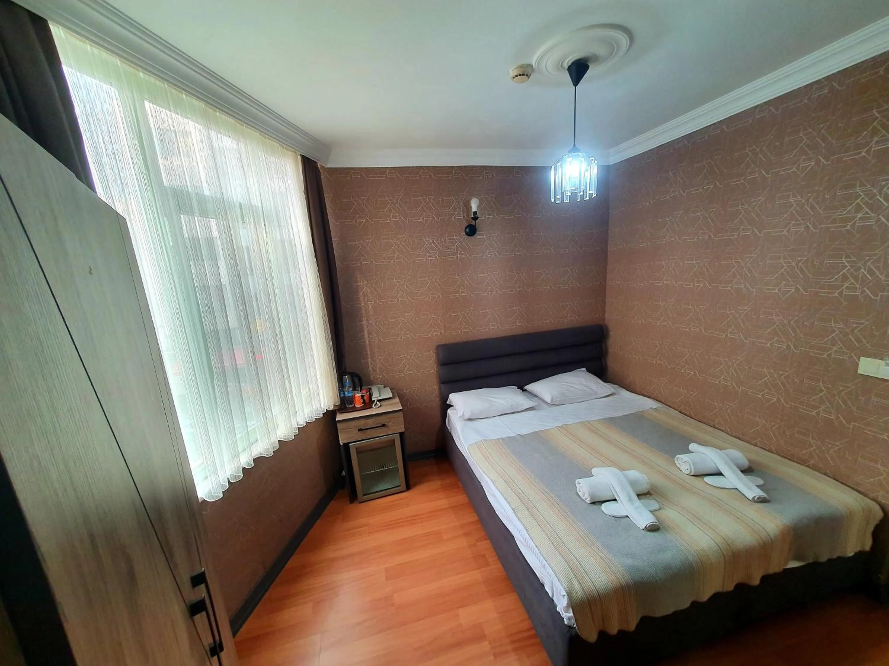 Photo of the whole room, Bed in Omega Luxx Hotel