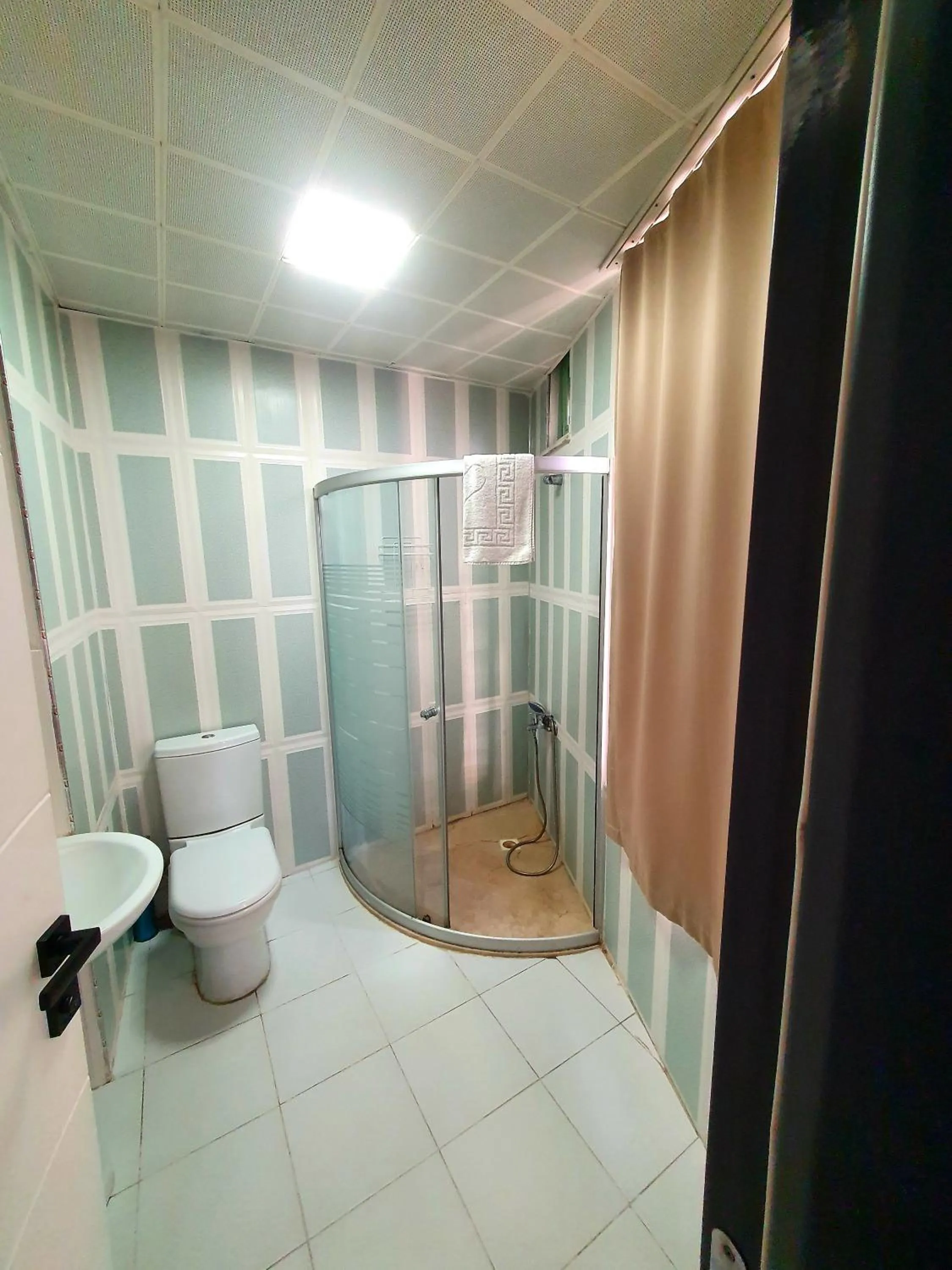 Bathroom in Omega Luxx Hotel