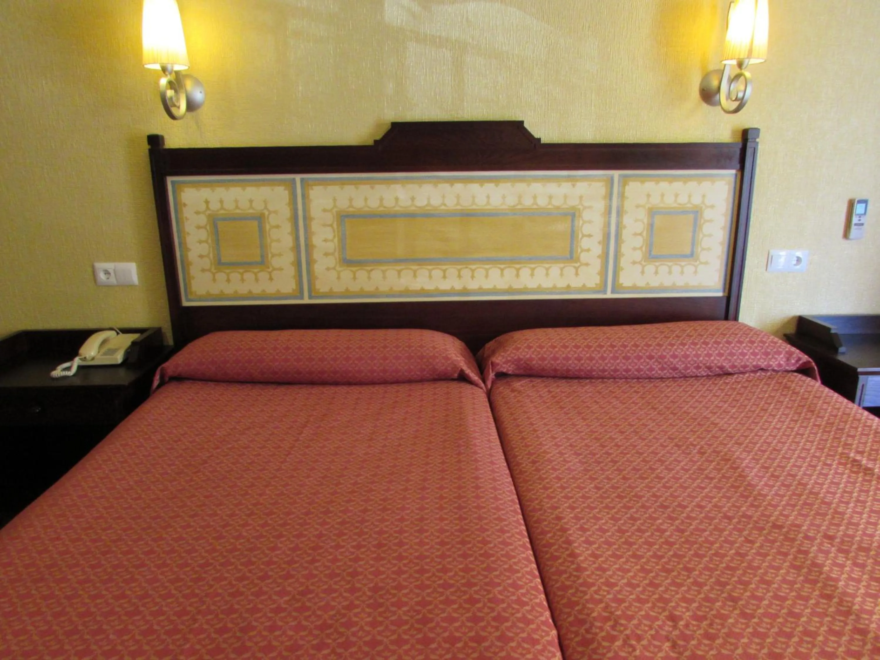 Bed in PARAISO PLAYA Hotel